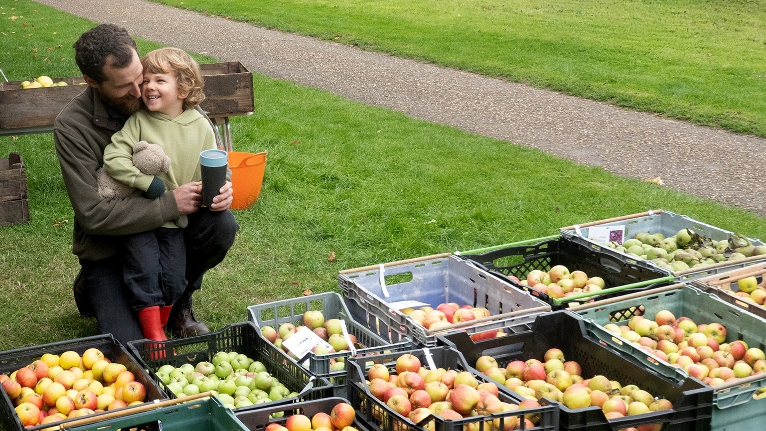 Family visitors enjoying Apple Harvest Weekend at Canons Ashby, Northamptonshire