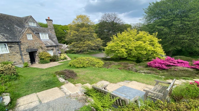 Outdoor seating by the front of the cottage at Stoneywell