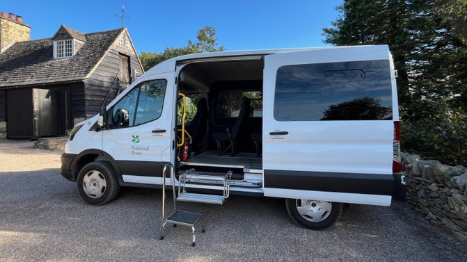 Shuttlebus with access steps parked in the Stables at Stoneywell, Leicestershire