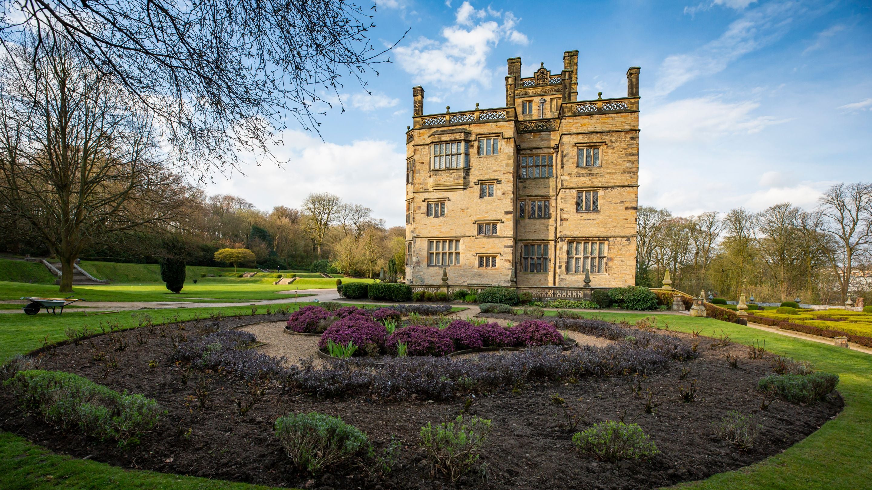 View across the circular Rose Garden at Gawthorpe Hall, Lancashire