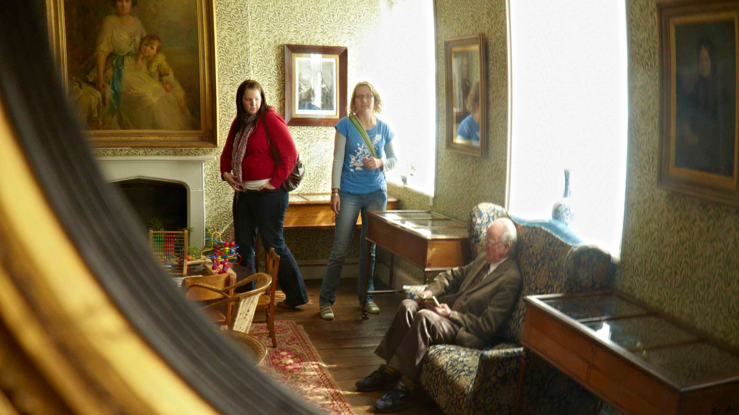 Visitors exploring the house at Rufford Old Hall, Lancashire