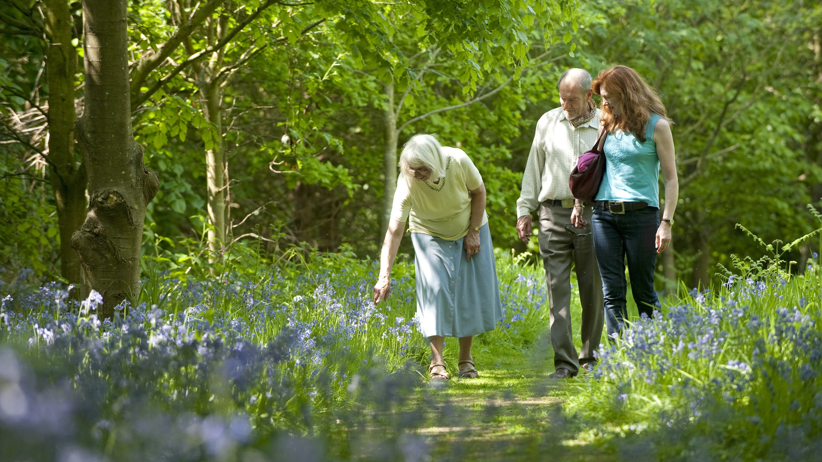Visitors in the garden at Speke Hall, Liverpool