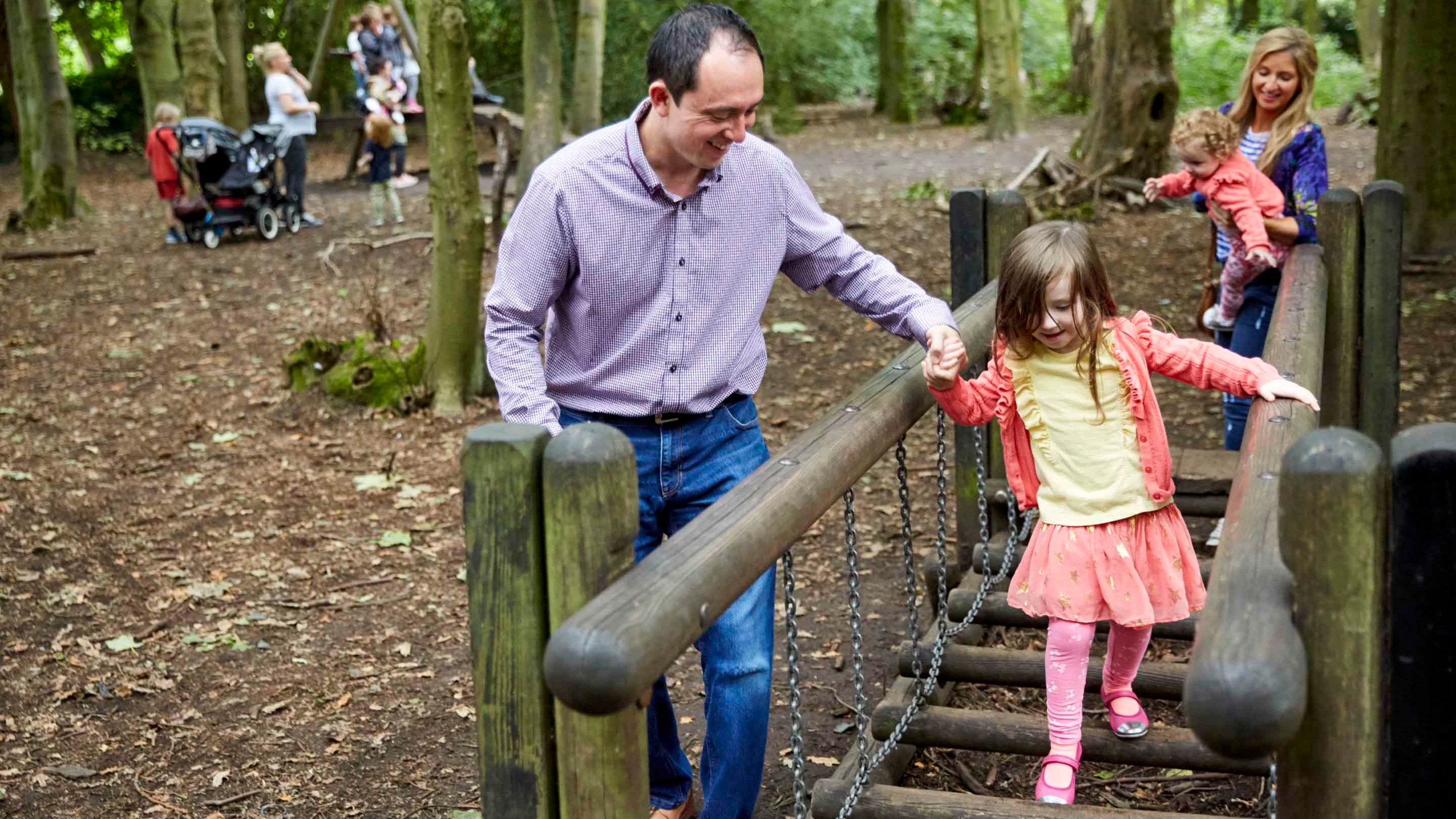 Visitors exploring the Play Trail at Speke Hall, Liverpool