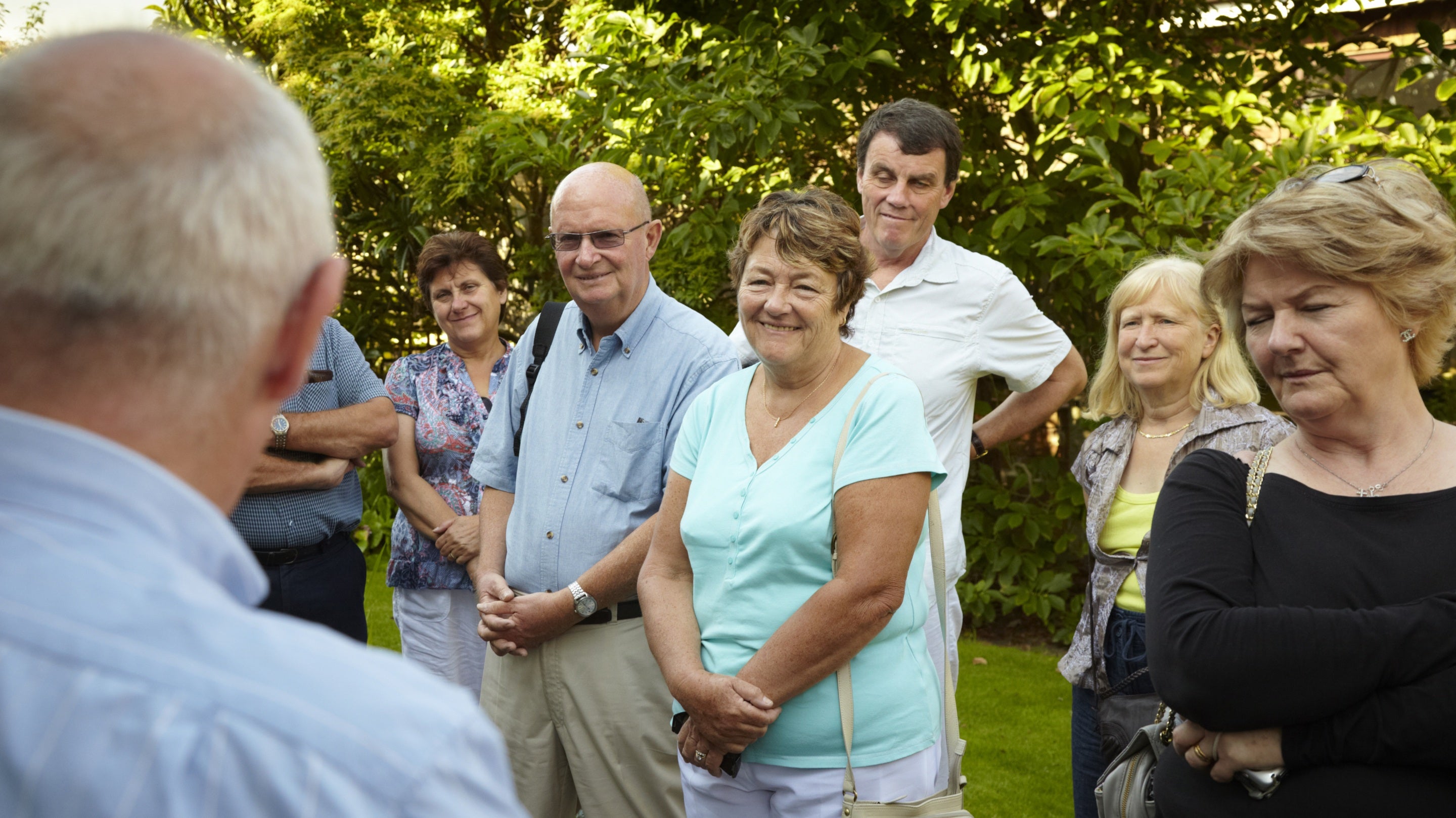 Visitors with the custodian on a tour at Mendips, the childhood home of John Lennon, in Woolton, Liverpool