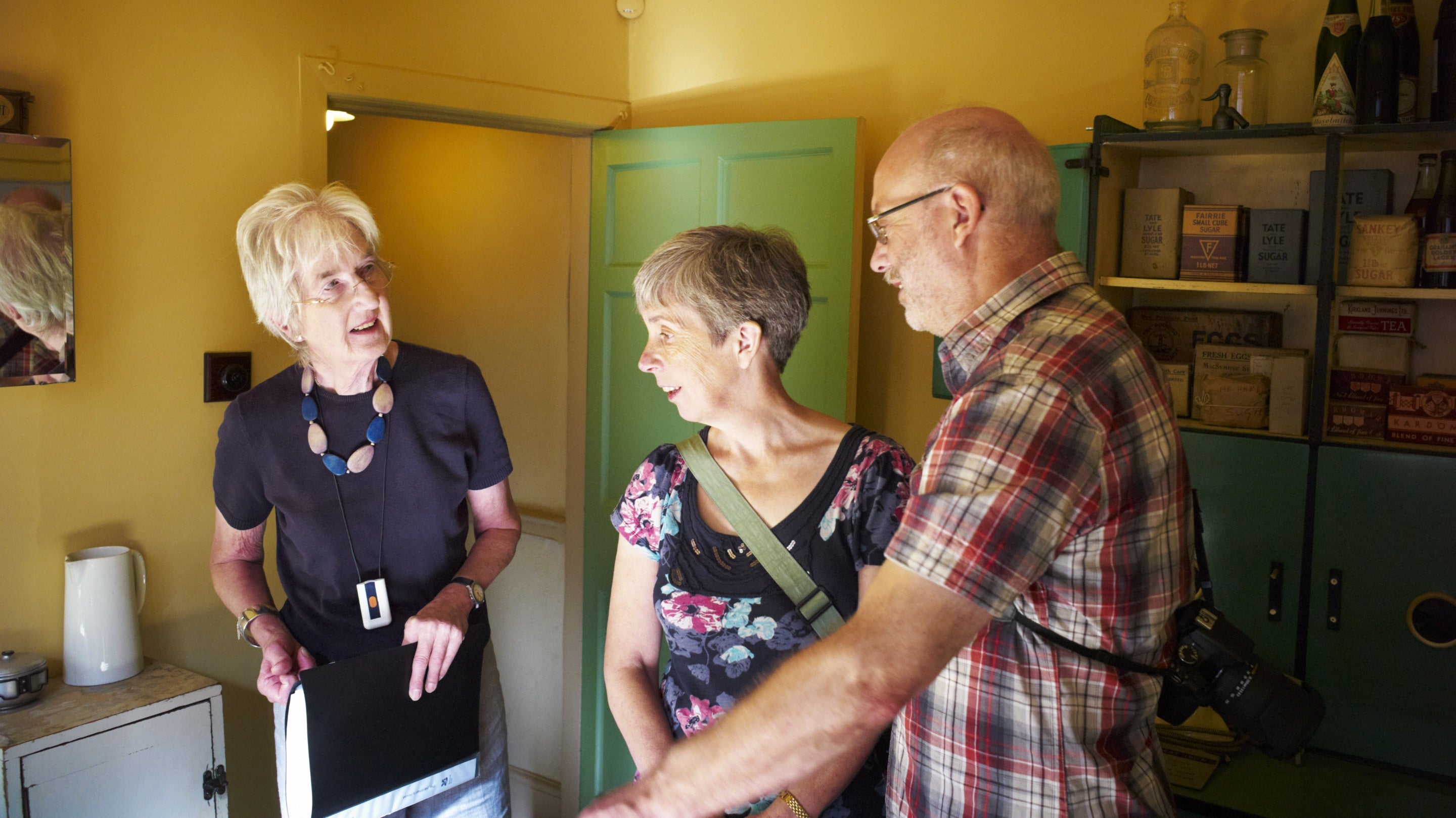 Visitors with a volunteer guide at The Hardmans' House, 59 Rodney Street, Liverpool.