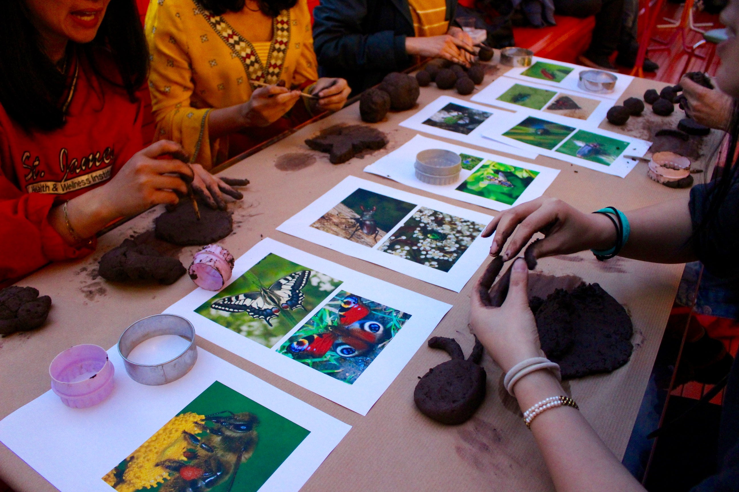 Blossom participants create seed bombs