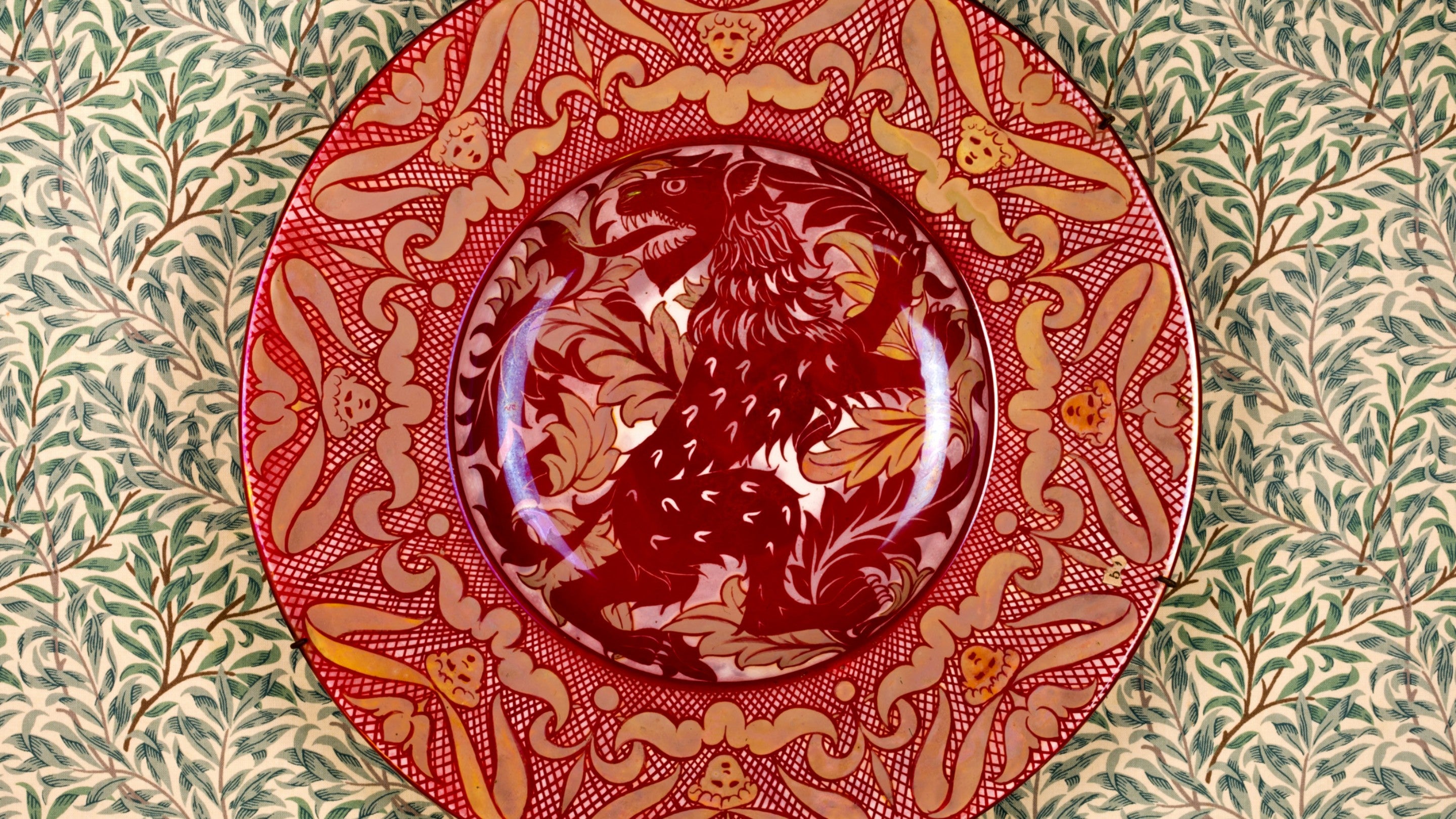 A William De Morgan lustre-painted earthenware dish with heraldic lion, from the collection at Carlyle's House