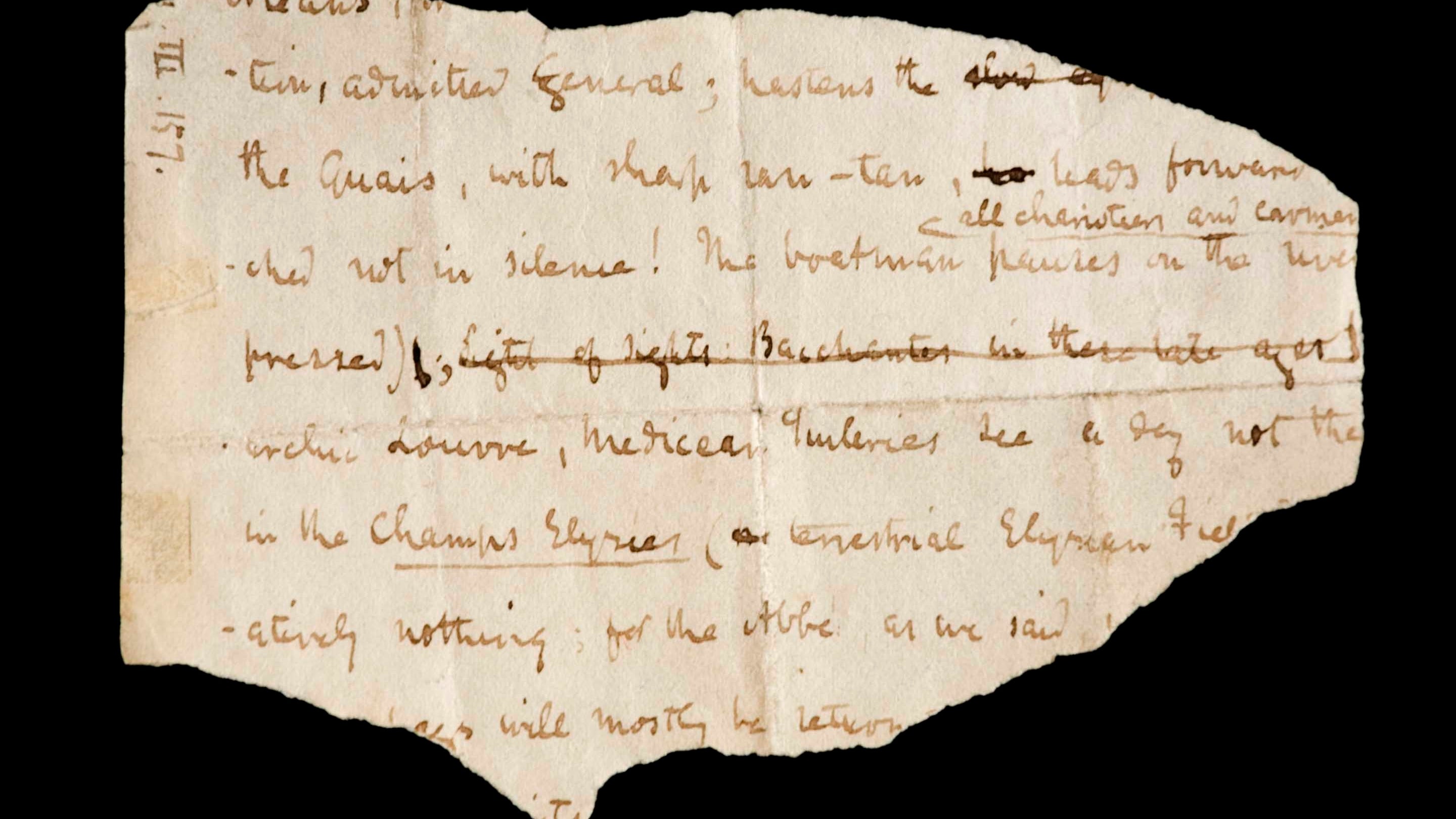 An image of a torn piece of paper against a black background with old-fashioned looped handwriting showing an extract from Thomas Carlyle's manuscript of The French Revolution at Carlyle's House, London
