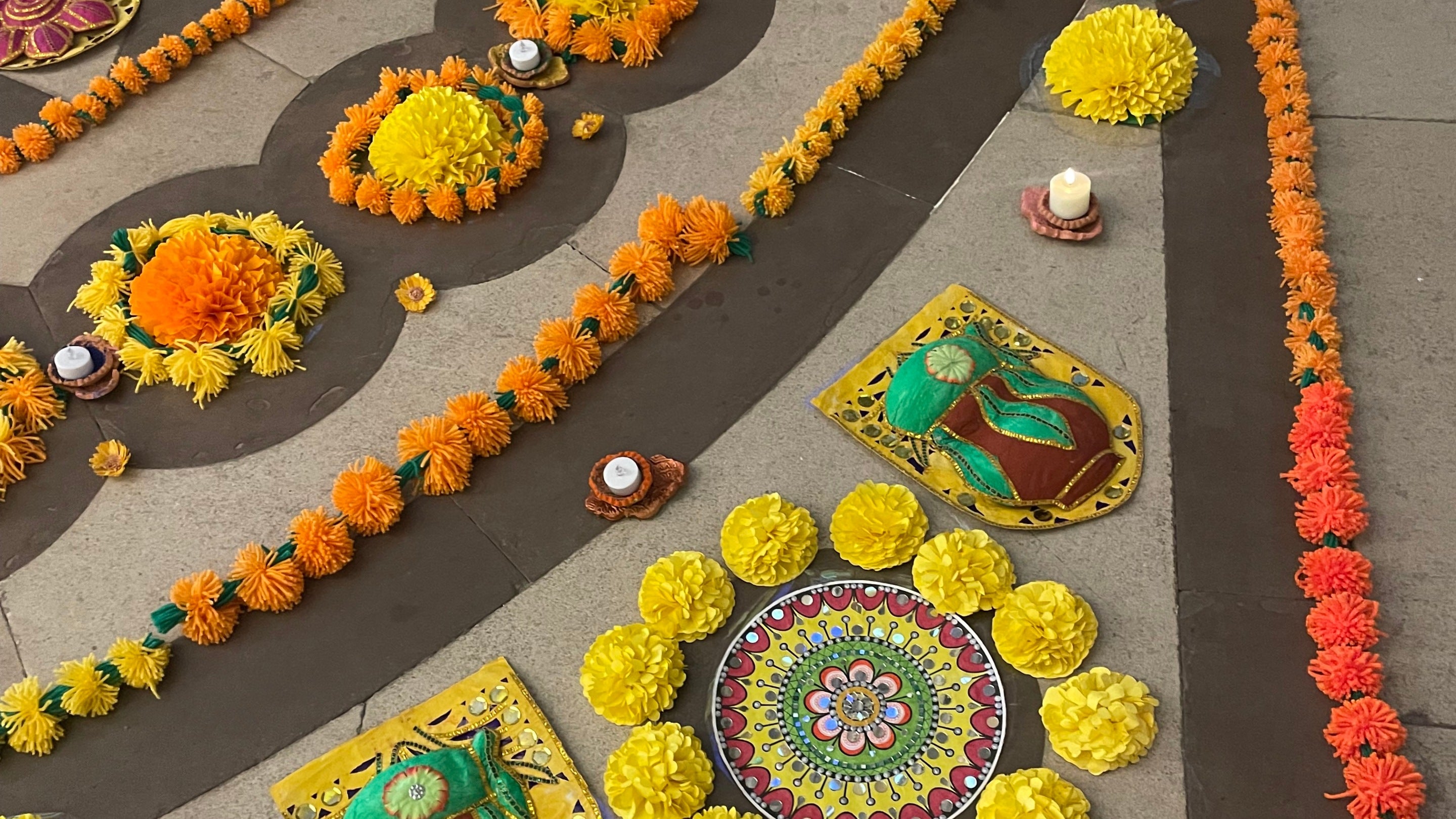 Diwali decoration detail with tealights at the Marigold Festival 2025 at Osterley, London