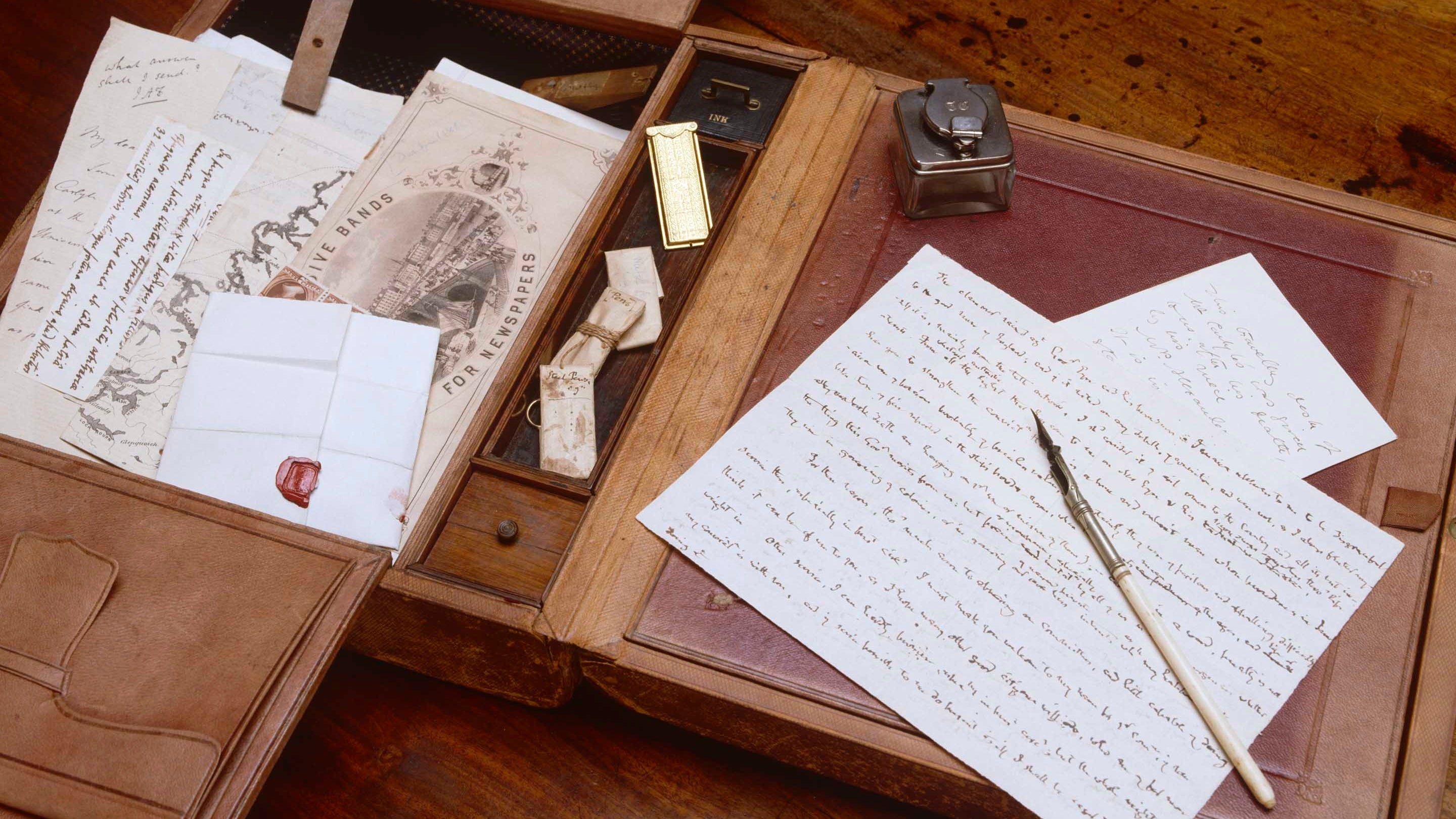 An image of letters and writing equipment laid out on Carlyle's desk at Carlyle's House, London