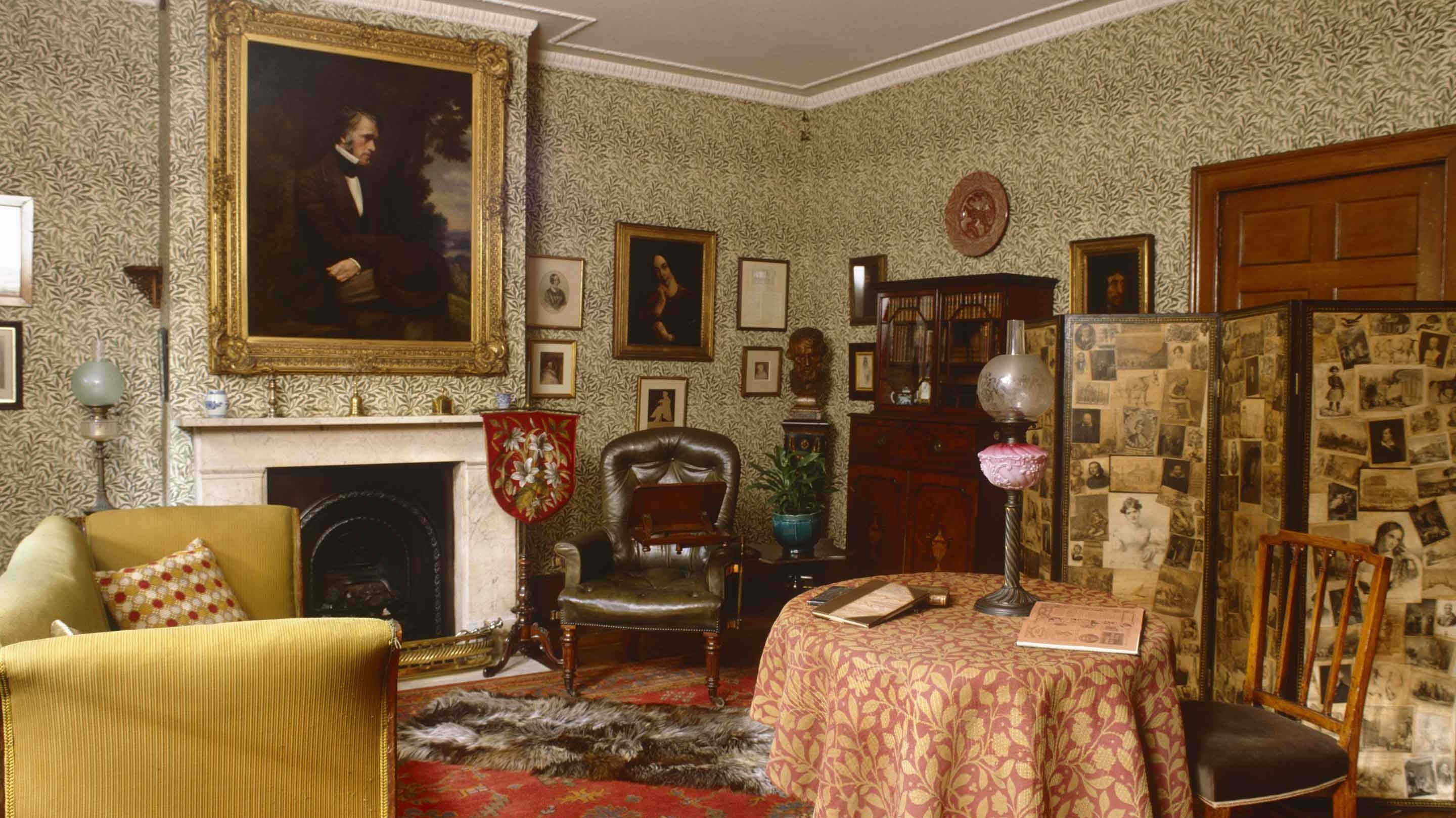 Interior detail of the Drawing Room at Carlyle's House in London showing 19th century furniture and paintings