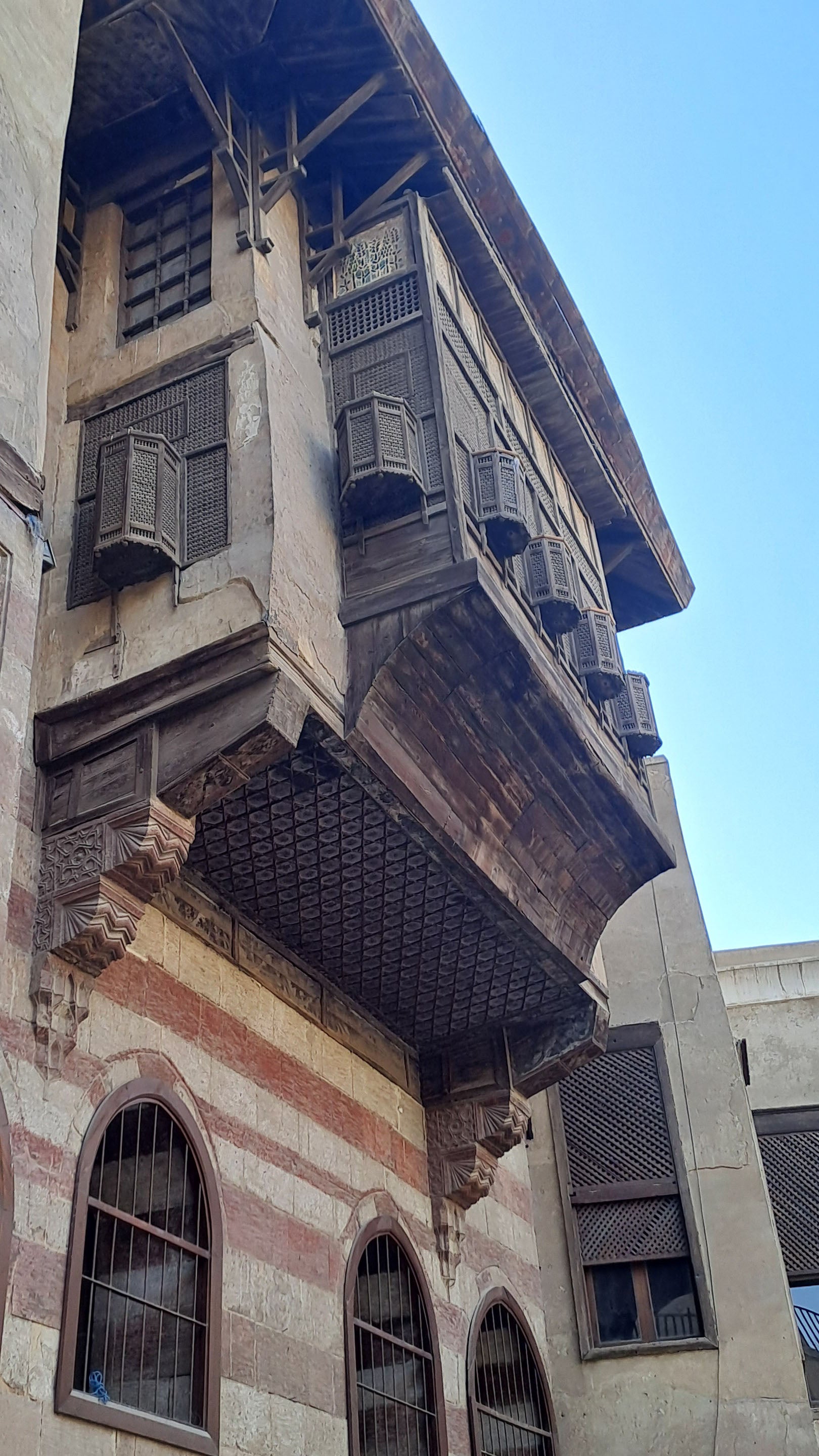 The exterior of Bayt al-Razzaz, with carved mashrabeya window