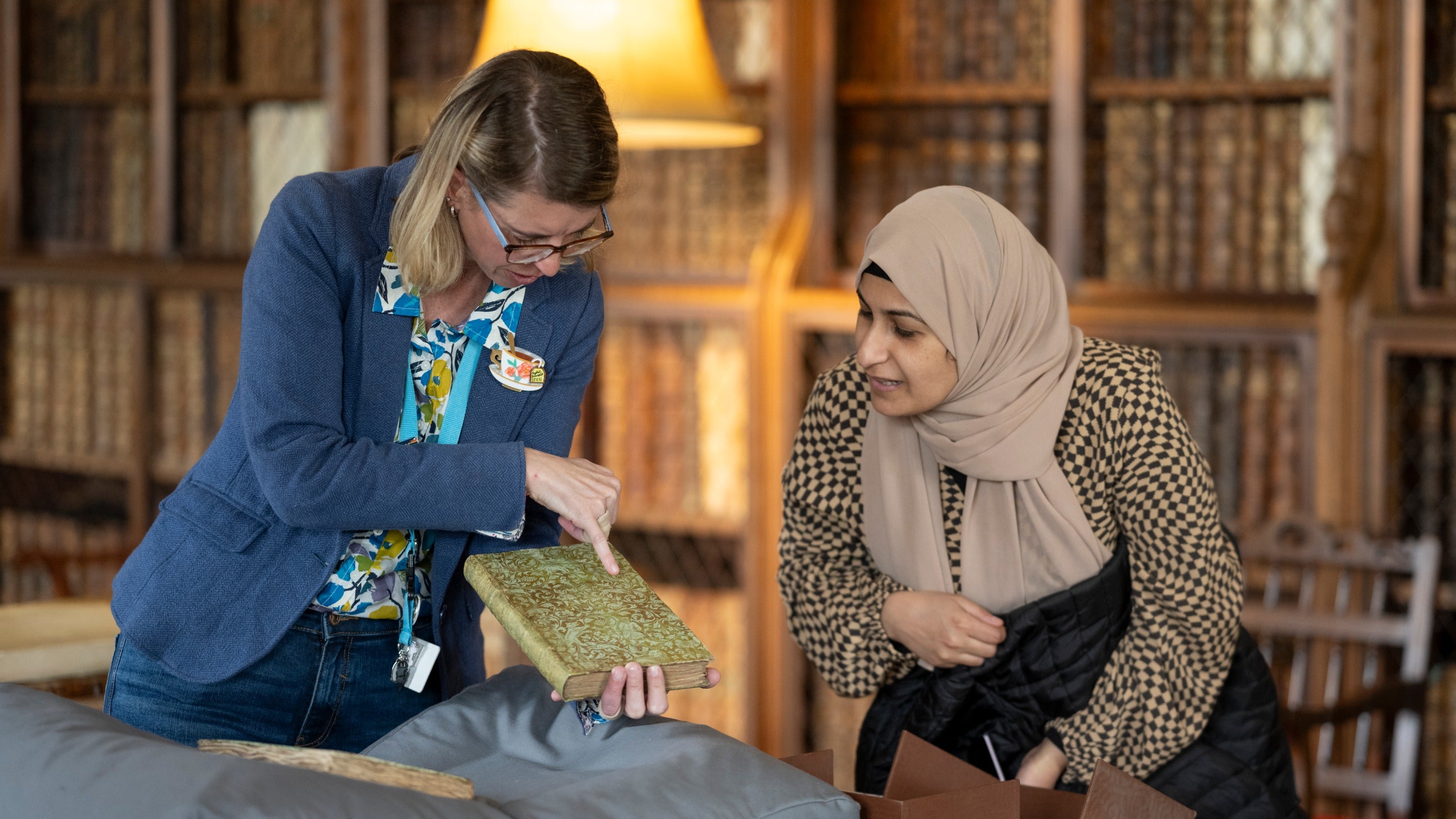 A member of staff gives a talk in the Library at Blickling Estate, Norfolk