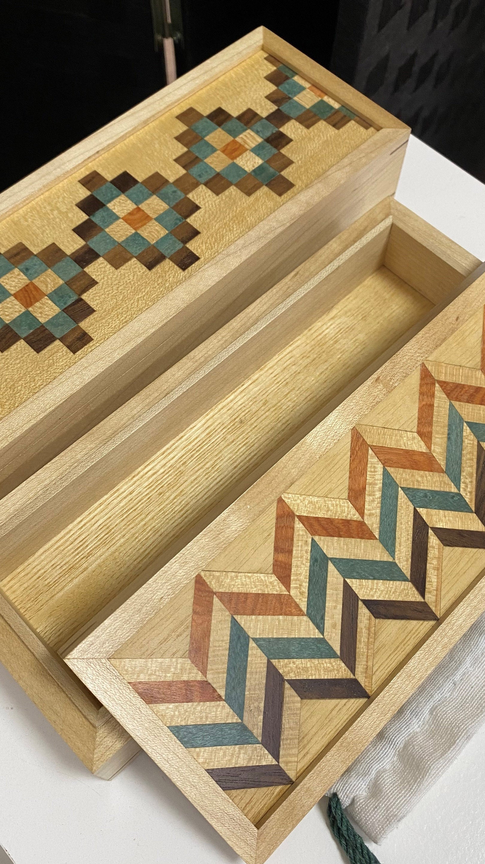 Two wooden boxes crafted by Nesreen Sharara, Artist in residence at Blickling Estate