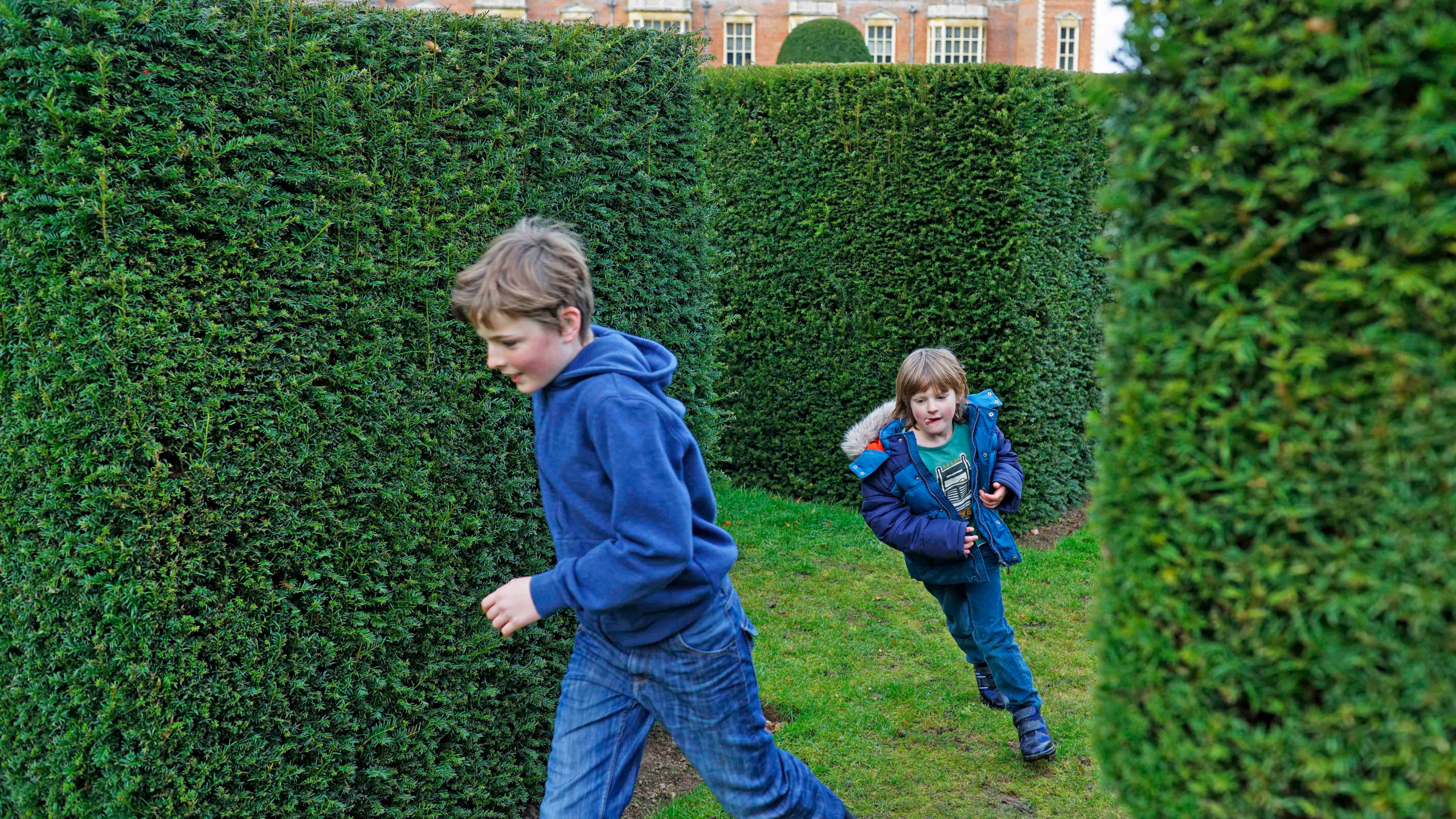 Children playing in the Parterre Garden at Blickling Estate, Norfolk