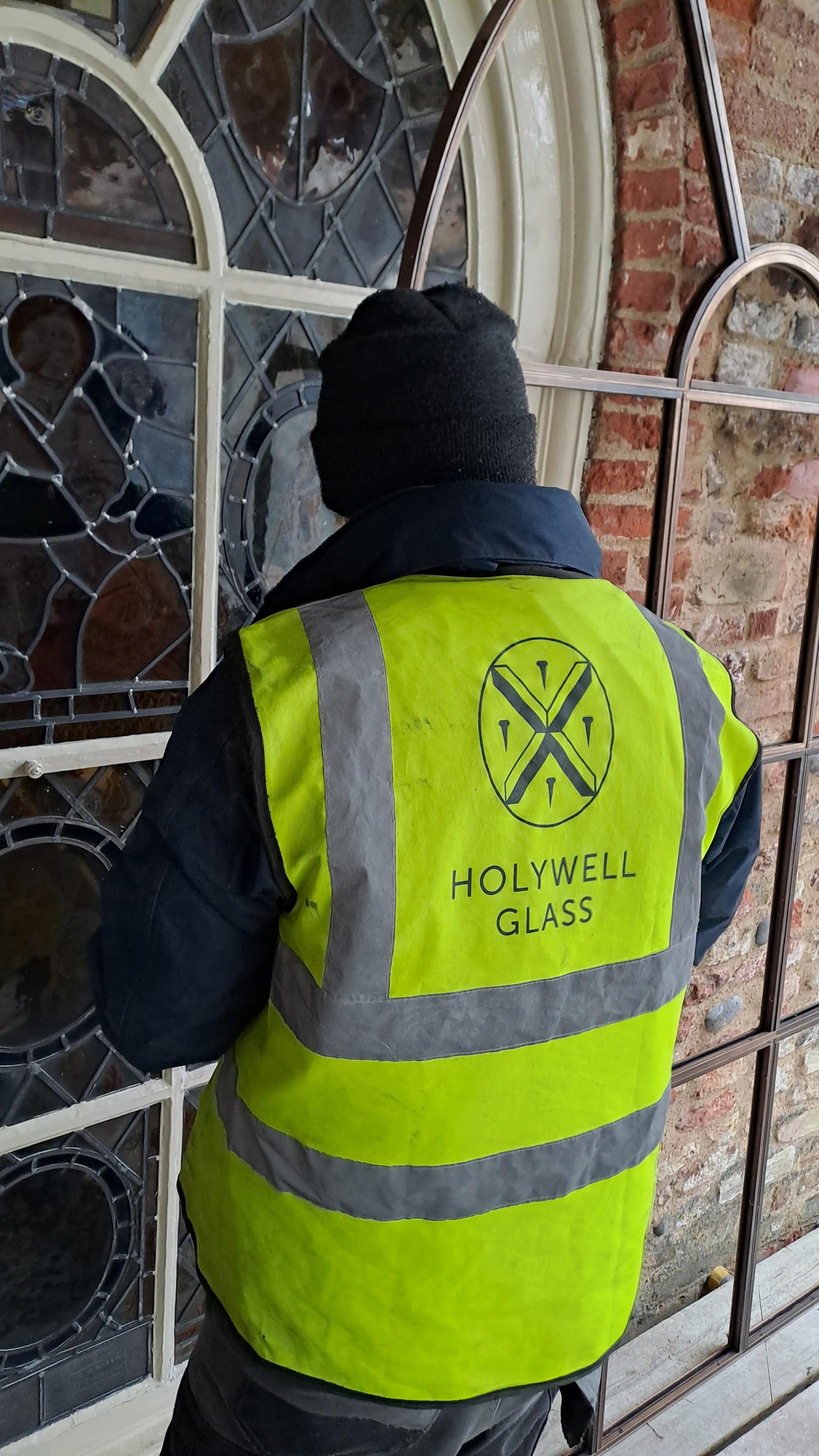 Installing the Environmental Protective Glazing at Elizabethan House