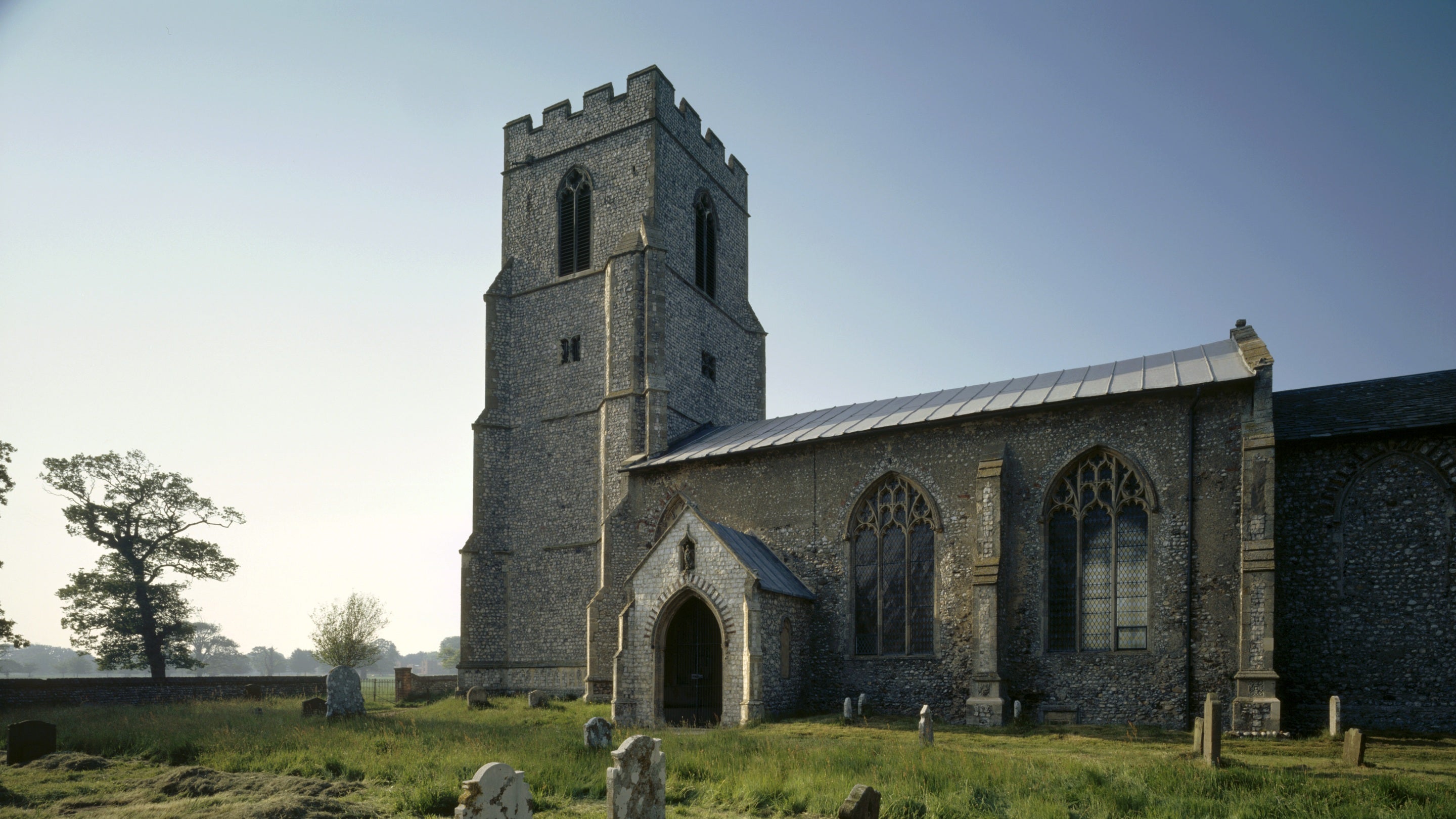 Felbrigg Church and graveyard on a spring day. St Margaret's Church is a parish church and is not owned by the National Trust.