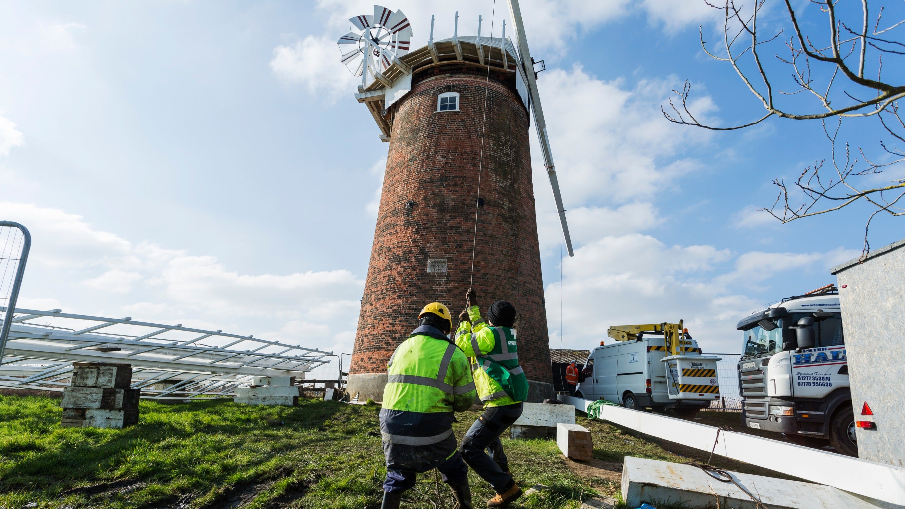 Installing the new stocks and sail frames during the restoration project at Horsey Windpump, Norfolk