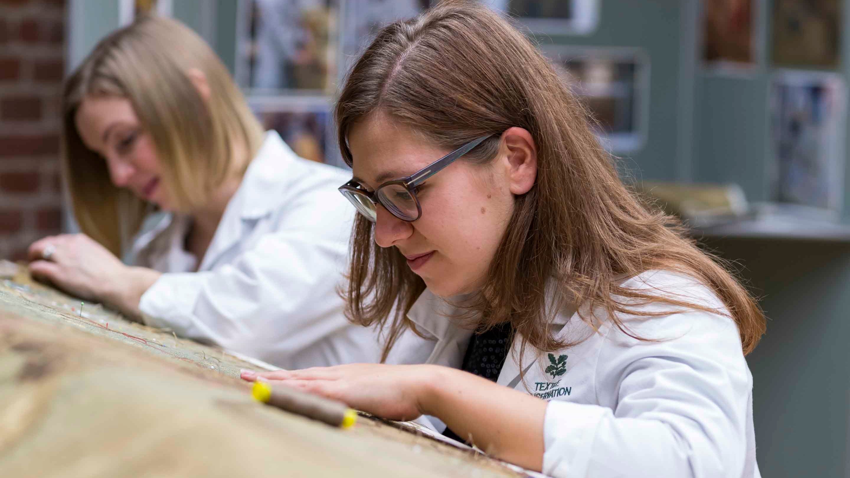Staff working at the Textile Conservation Studio, Norfolk