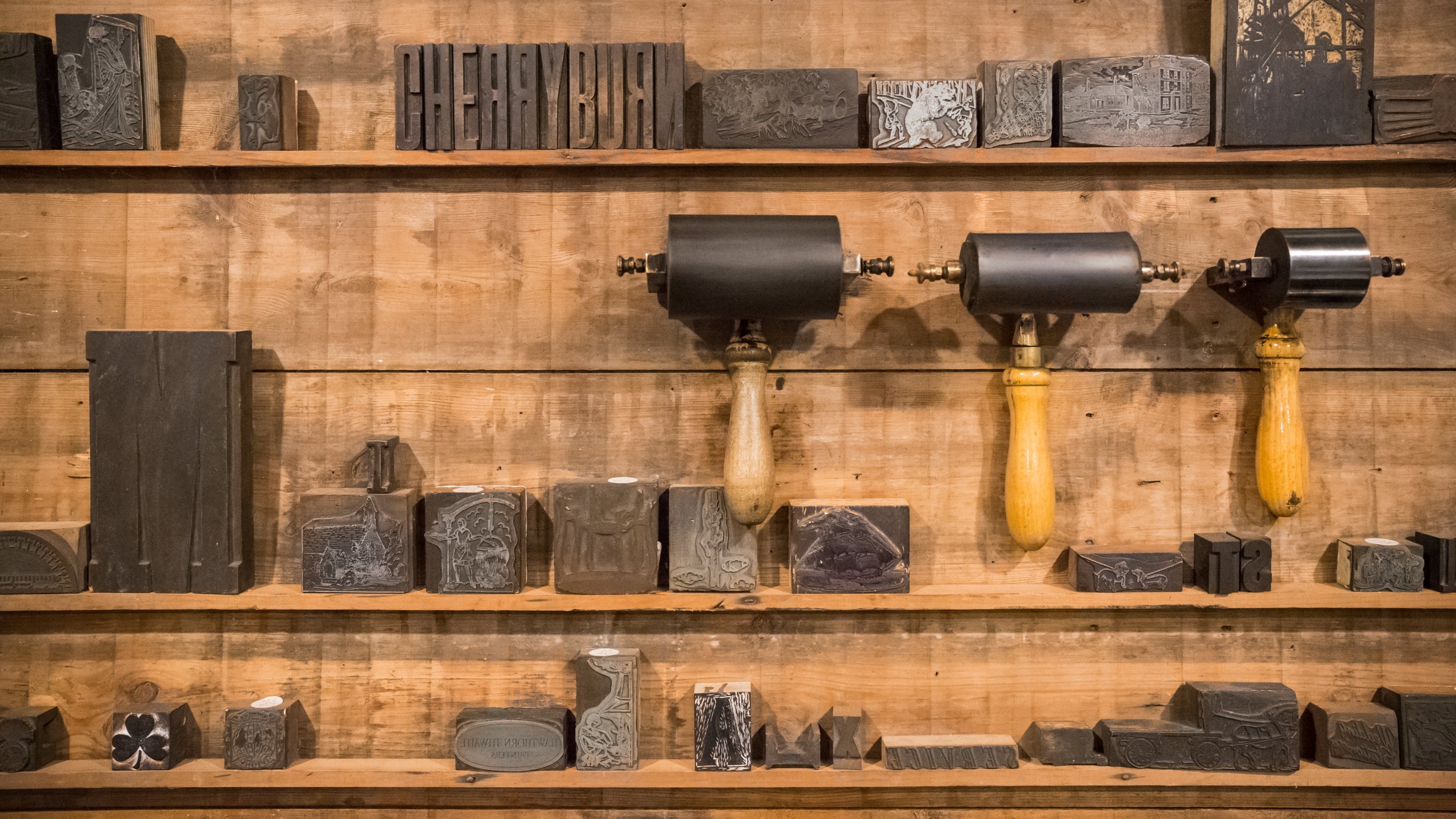 Printing equipment in Thomas Bewick's Press Room at Cherryburn, Northumberland. Including punches and wooden letter and number blocks.
