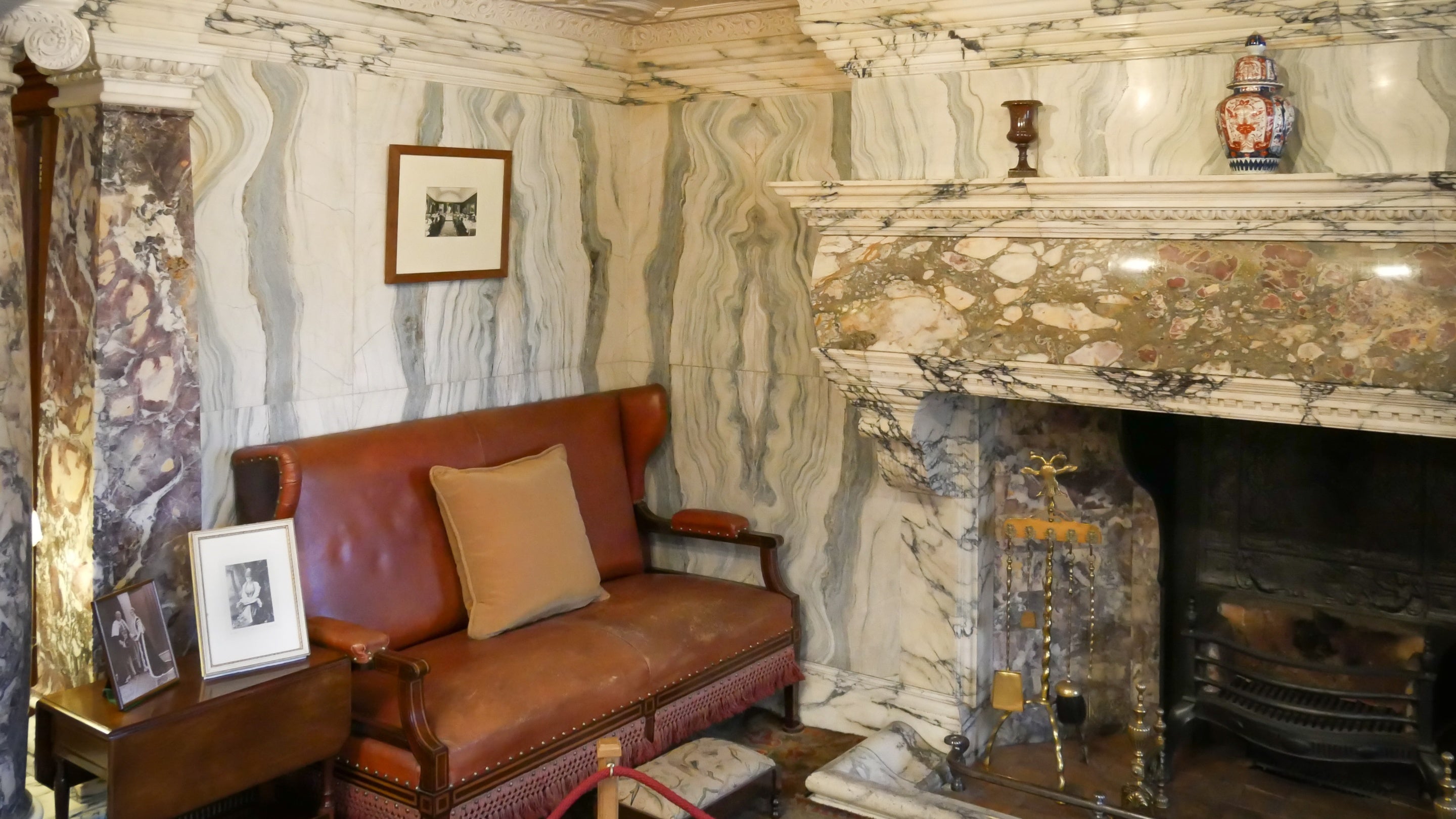 Inside the italian marble inglenook fireplace in the Drawing Room at Cragside, Northumberland