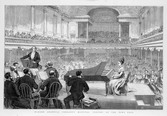 A blank and white drawing of Arabella Goddard in concert with an orchestra, 7 October 1874 at Melbourne Town Hall. Arabella is sitting by the piano on stage while an audience watches.