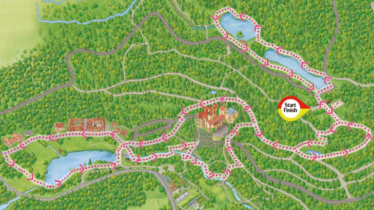 A graphic map of Cragside showing the route of the Festive 5-Miler hike by pink dots and arrows.