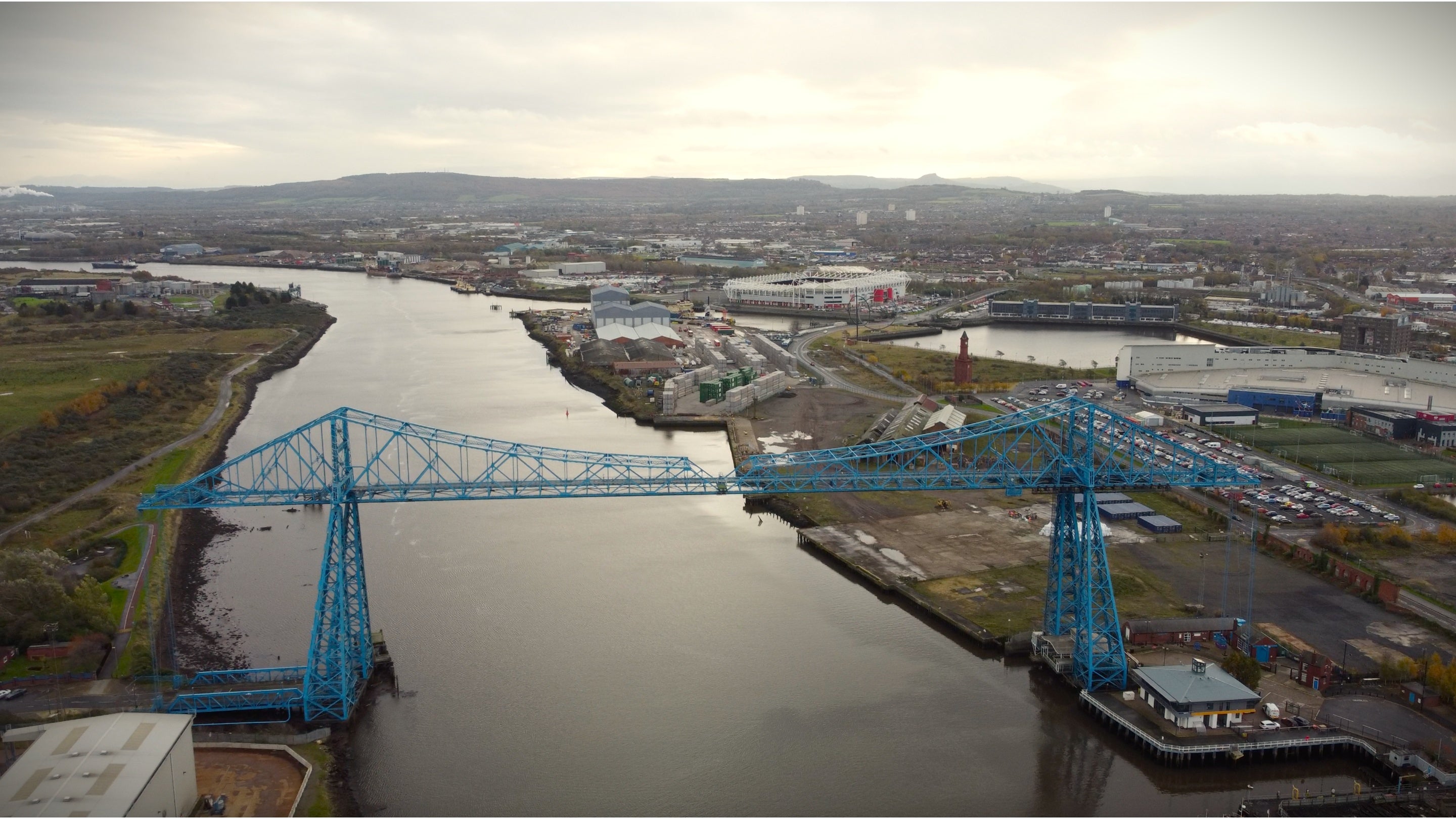Transporter Bridge over the River Tees with Roseberry Topping in the far distance