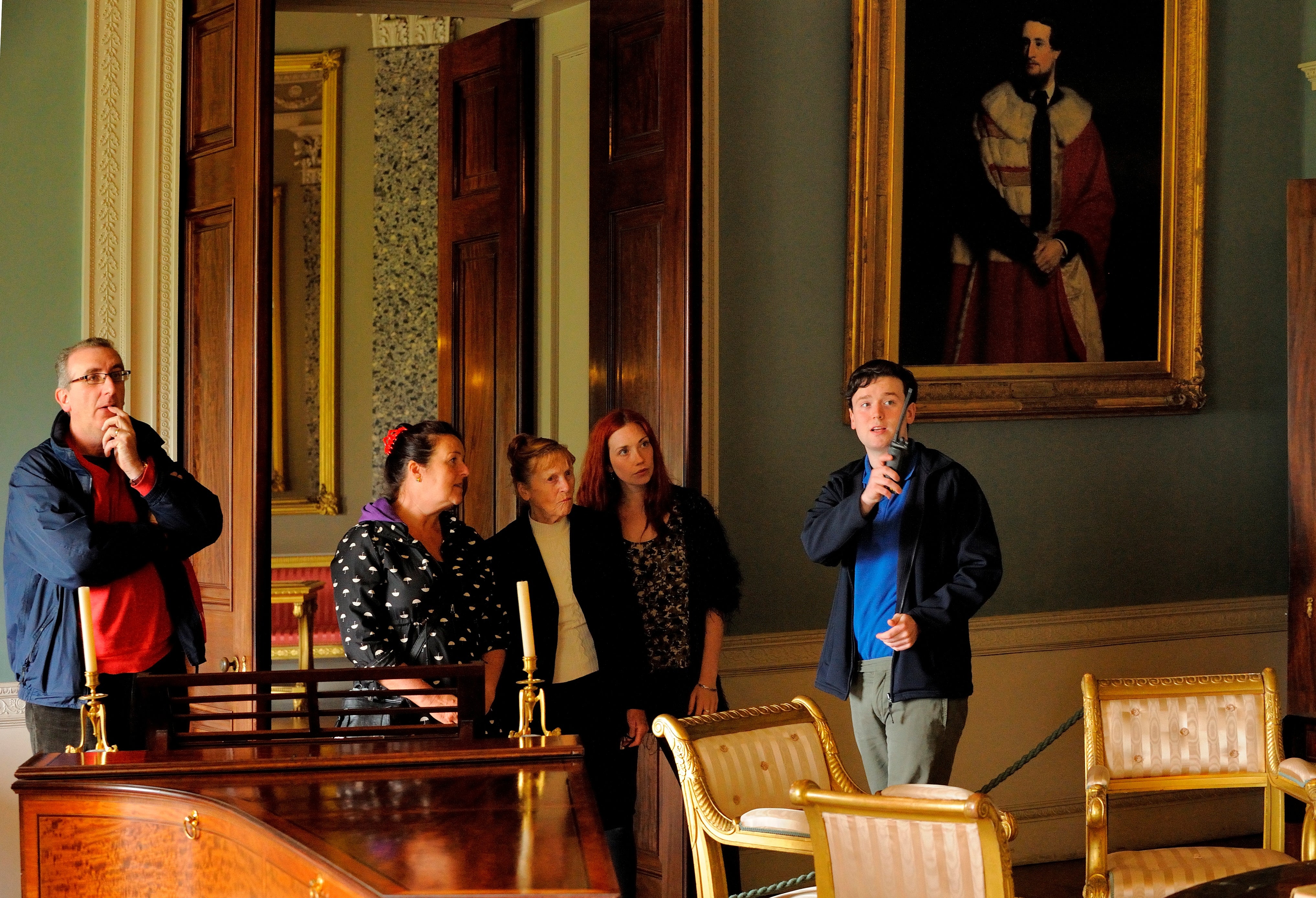 Group enjoy house tour of Castle Coole