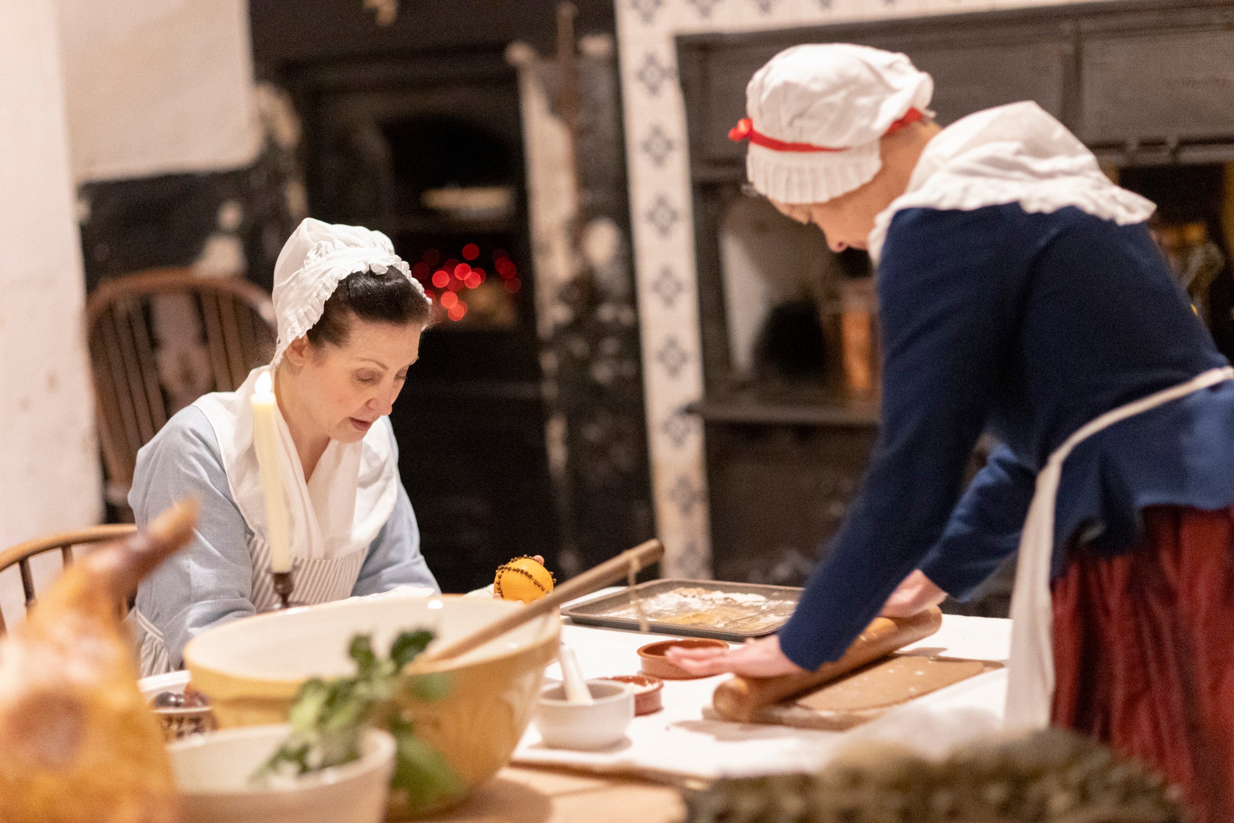 Living History performers baking treats in Castle Ward's Kitchen.