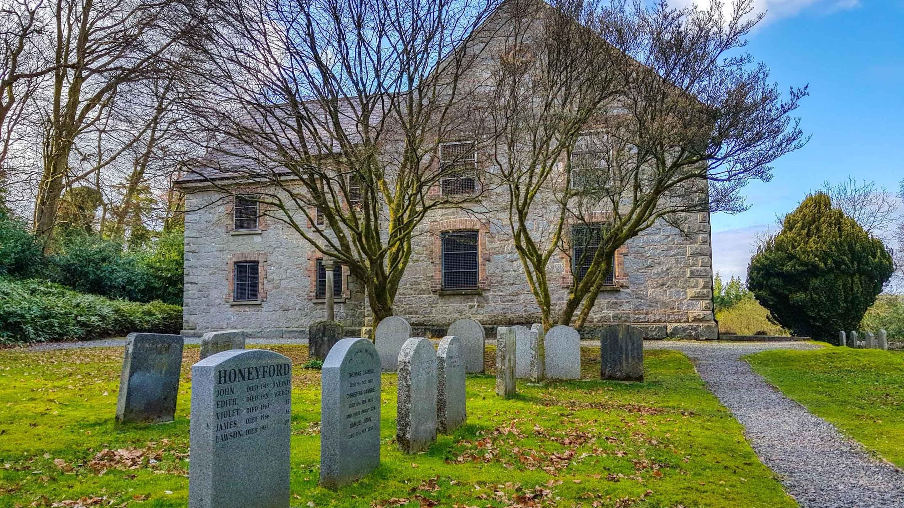 Bessbrook Meeting House at Derrymore with graves outside, Northern Ireland