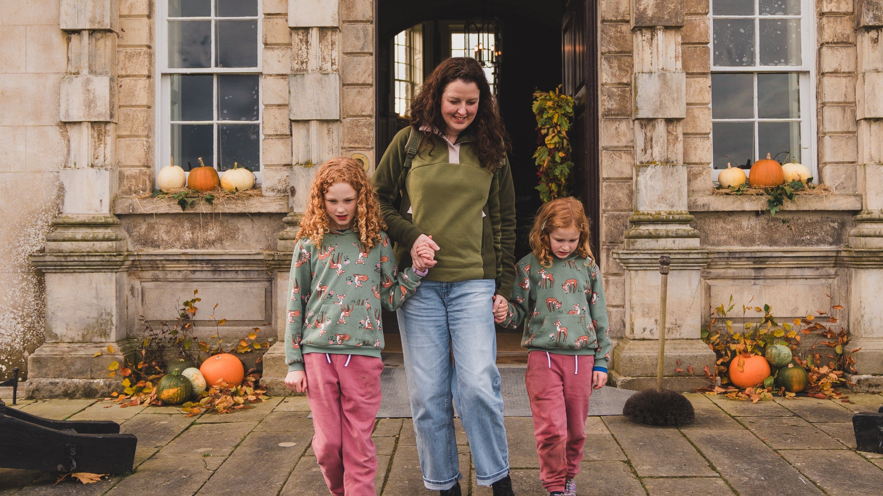Family at the front door of Florence Court House in Autumn