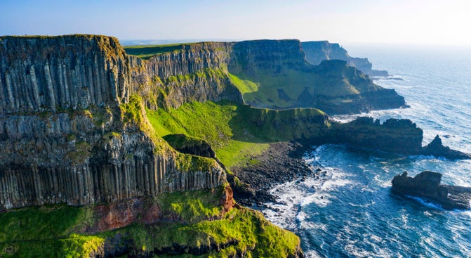Photo shows undulating layers of the Causeway columns from the clifftop path
