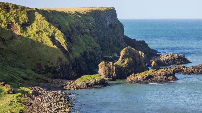 View of the Giant's Causeway landscape. A basalt dyke shaped like a camel