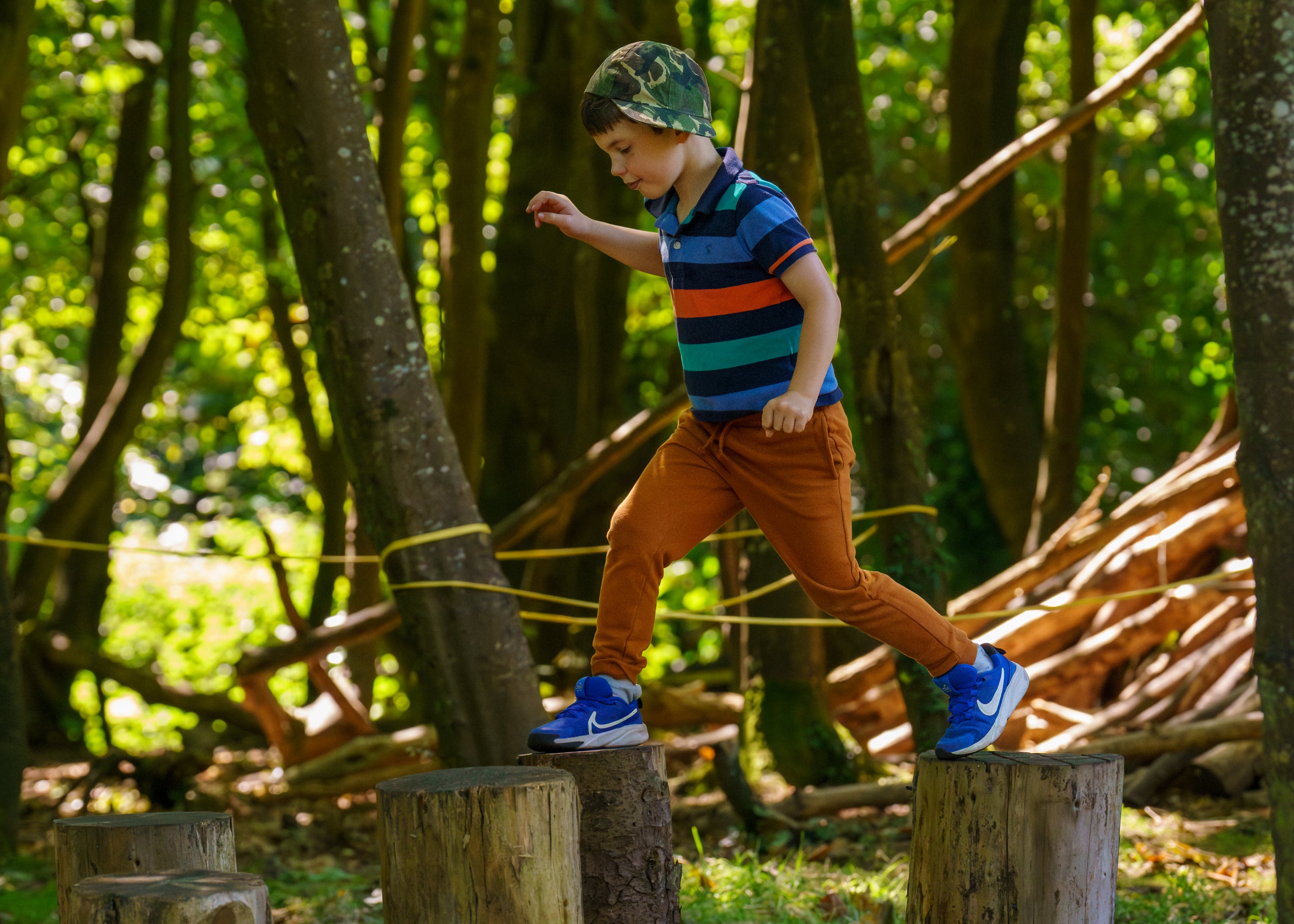 Boy plays at Summer of Play Mount Stewart