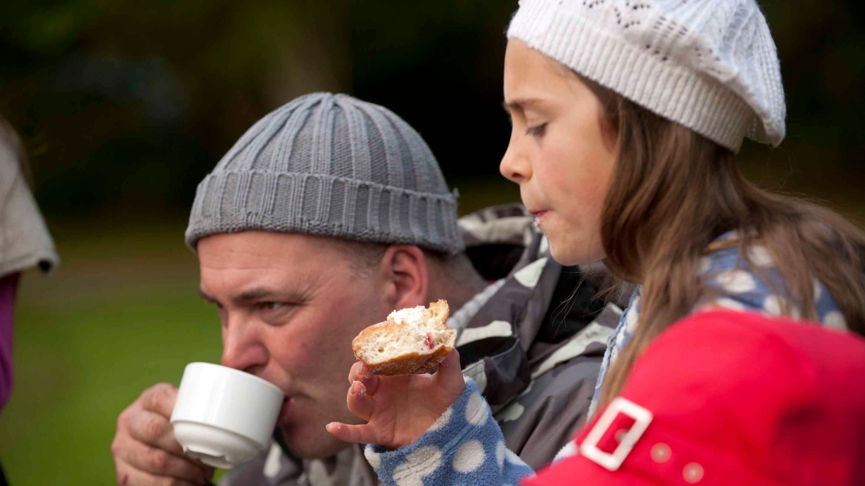 Visitors eating and drinking at Rowallane Garden, Co Down in October