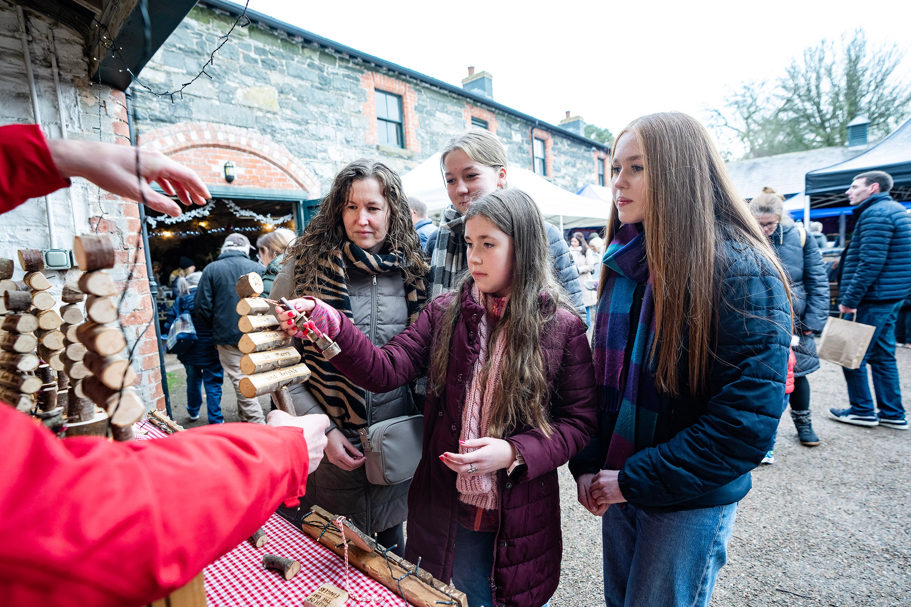 Family enjoying the annual Yuletide Market at Rowallane Garden