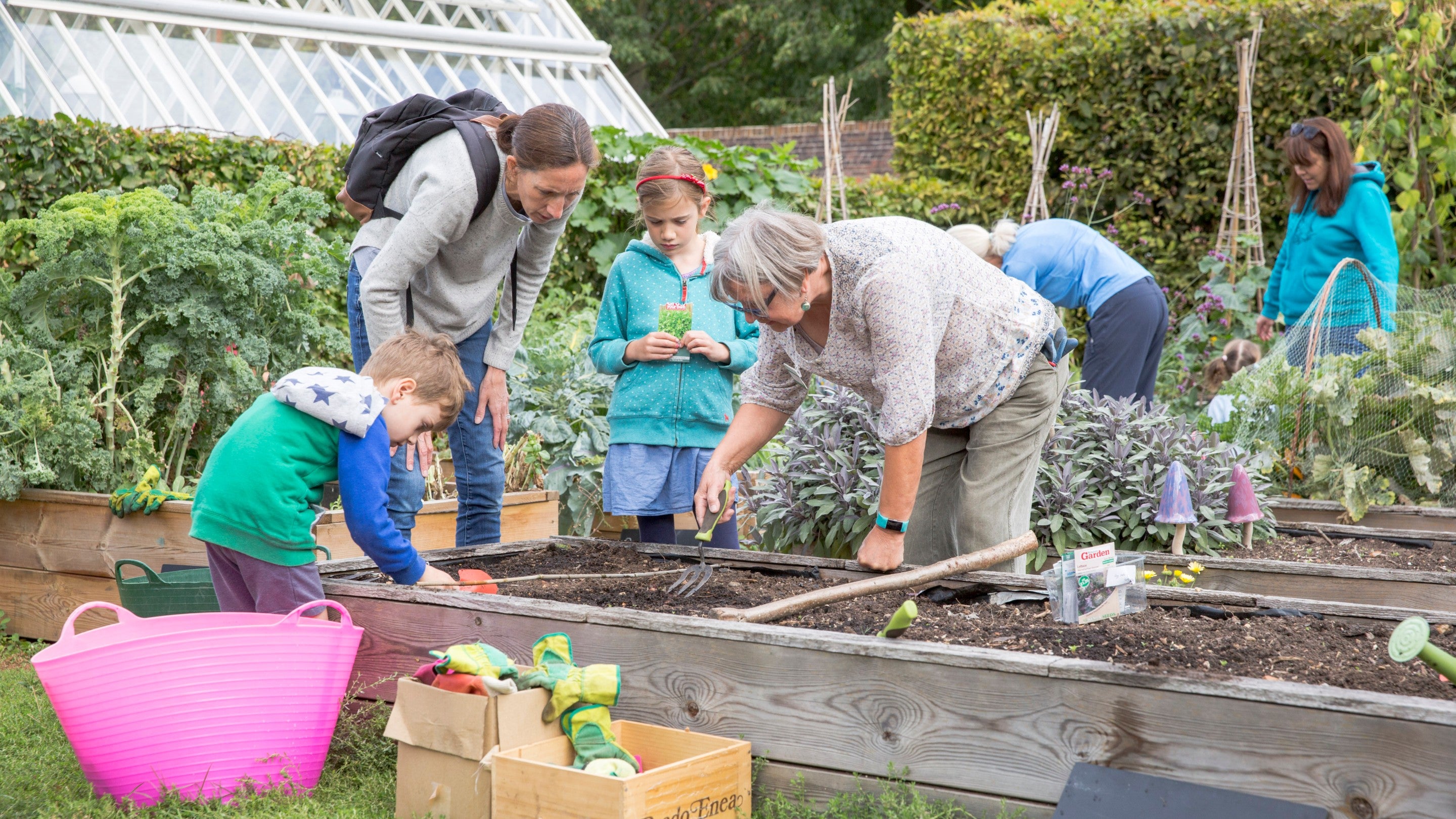 Visitors enjoying gardening activities