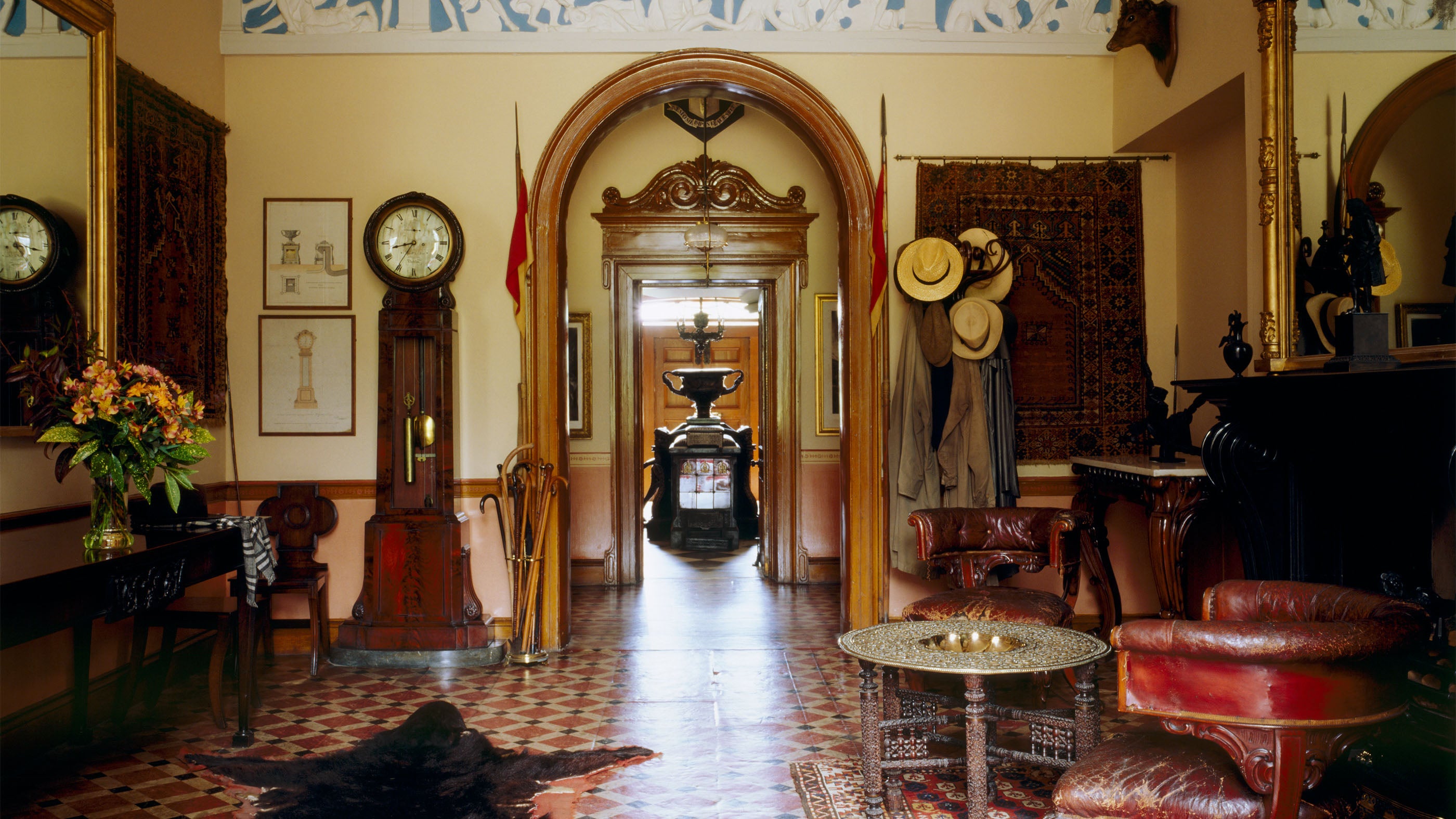 The East Hall, The Argory. Used as the entrance hall from the 1830s. The lances by the door were used by Capt. Shelton in the Crimea. John Wesley sat in one of the c17th chairs to the right.