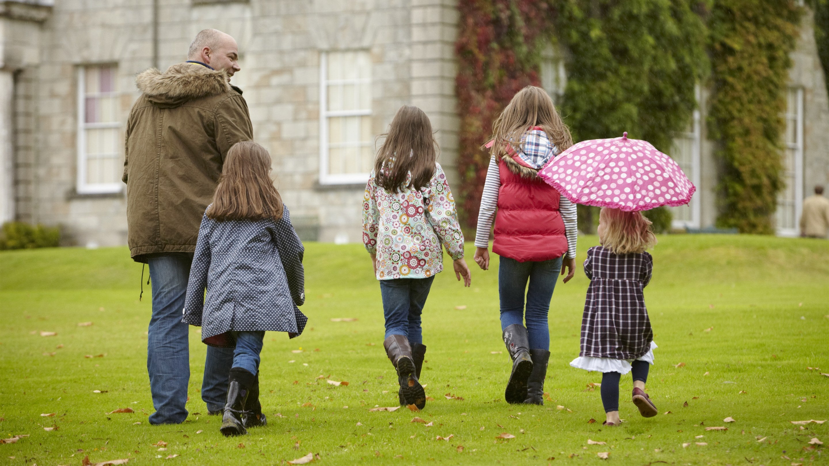 Family in the garden at The Argory, County Armagh.