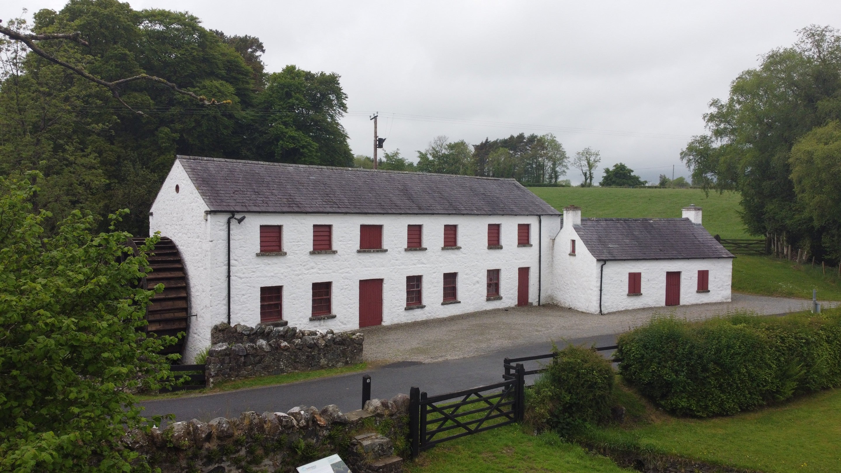 Exterior of Wellbrook Beetling Mill taken on an overcast day in County Tyrone