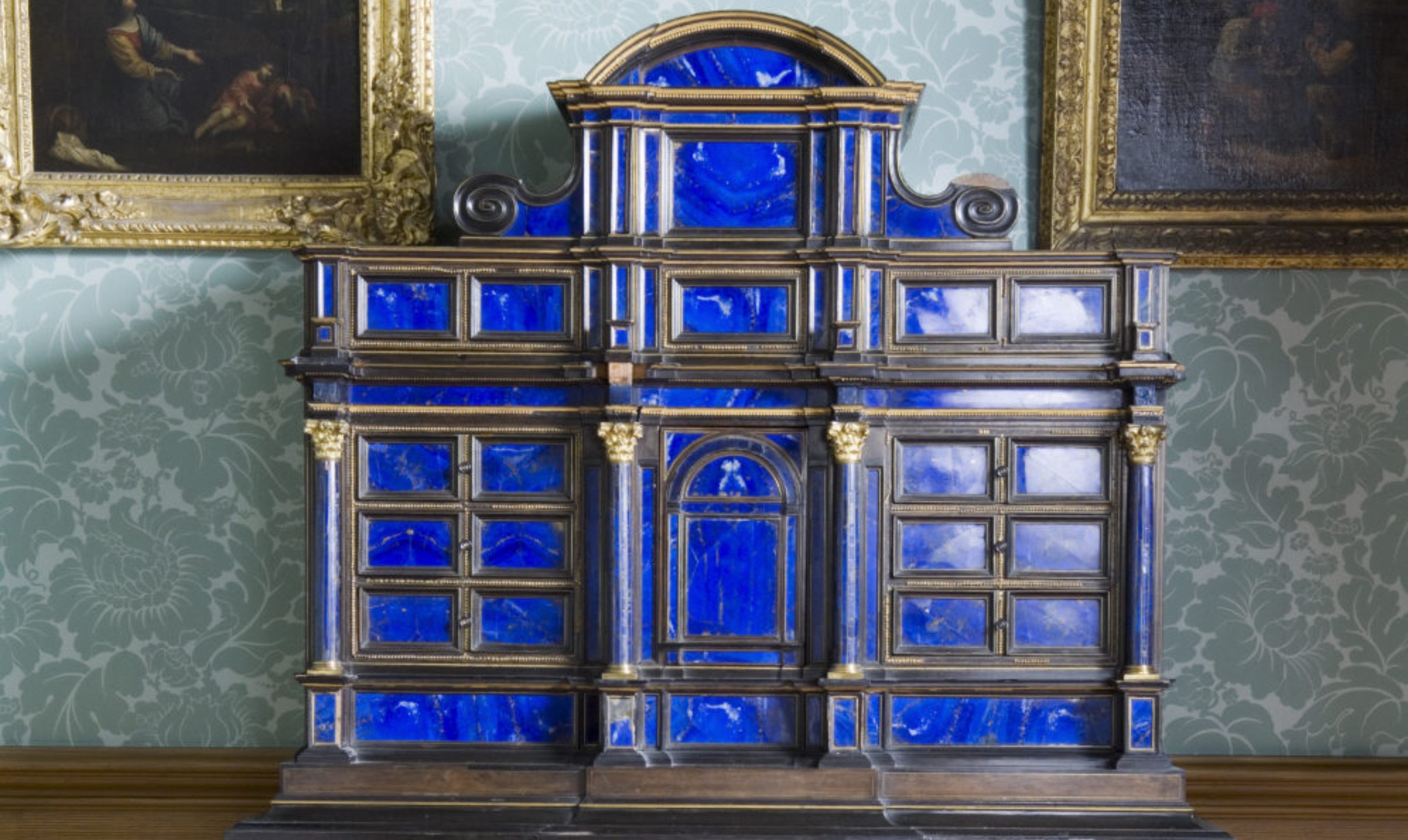 A late seventeenth century Italian, Florentine, lapis lazuli cabinet on a Charles II giltwood stand in the Dressing Room at Belton House, Lincolnshire,