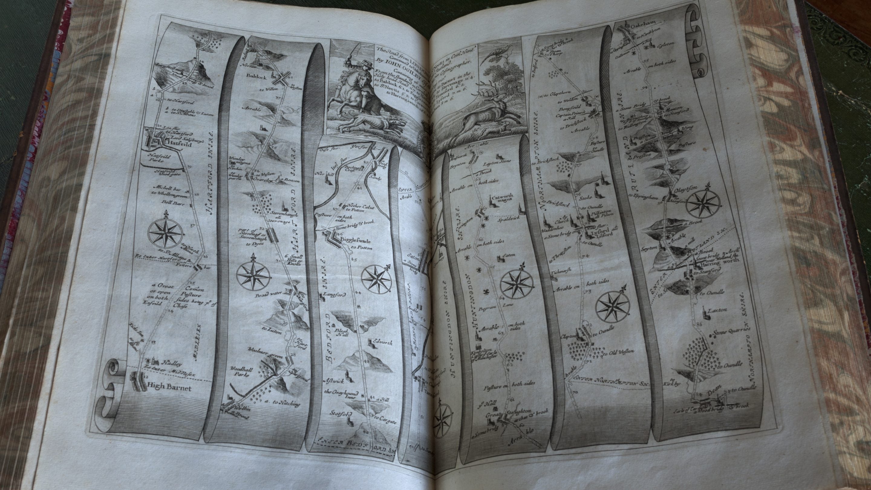 The atlas Britannia, published by John Ogilby in 1675, effectively the first road map of England, in the Library at Belton House, Lincolnshire.