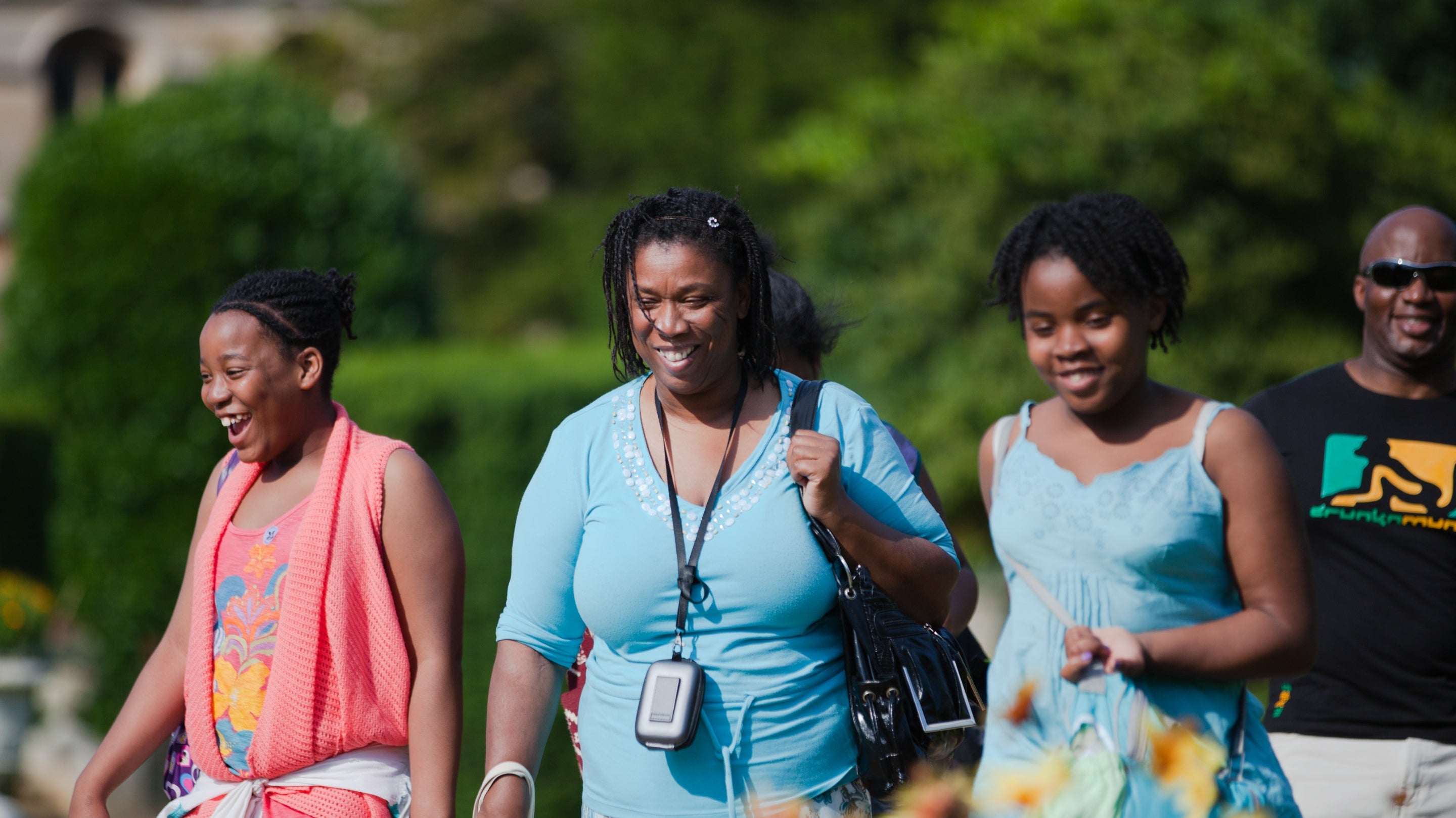 Family visiting the garden at Belton House, Lincolnshire