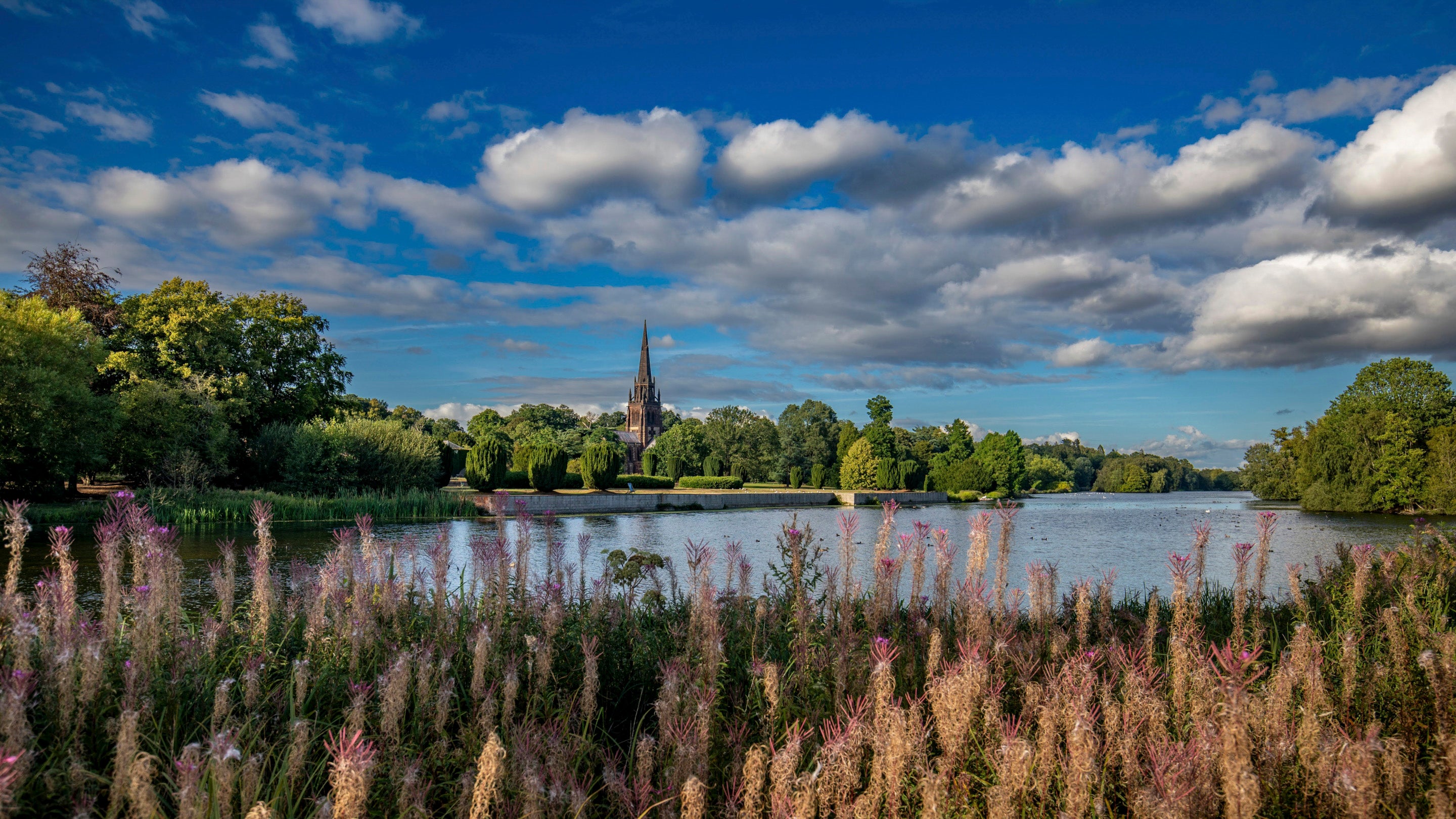 Looking across the lake to the Chapel & Pleasure Grounds