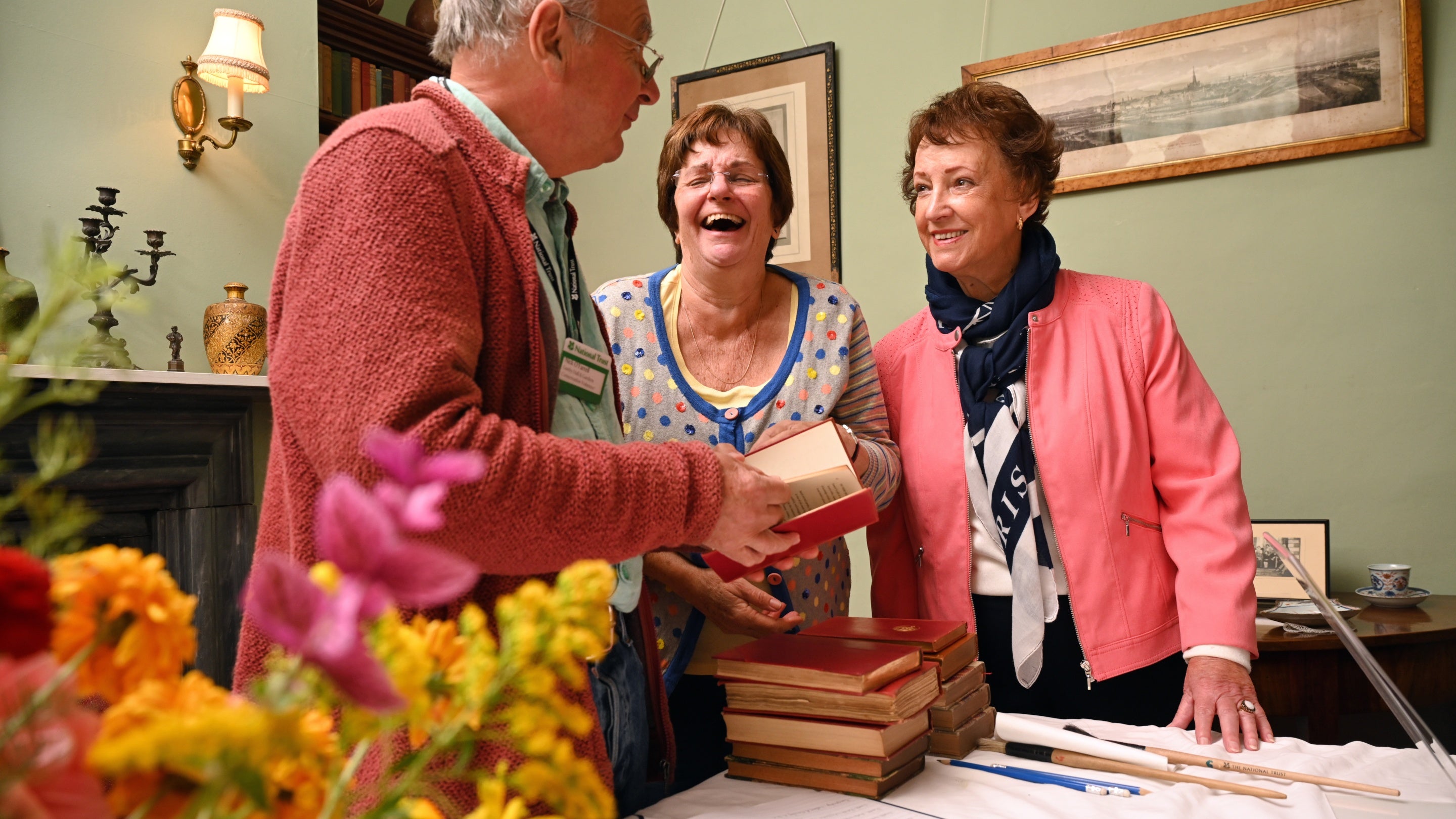 Volunteer talking with visitors at Gunby Hall, Lincolnshire