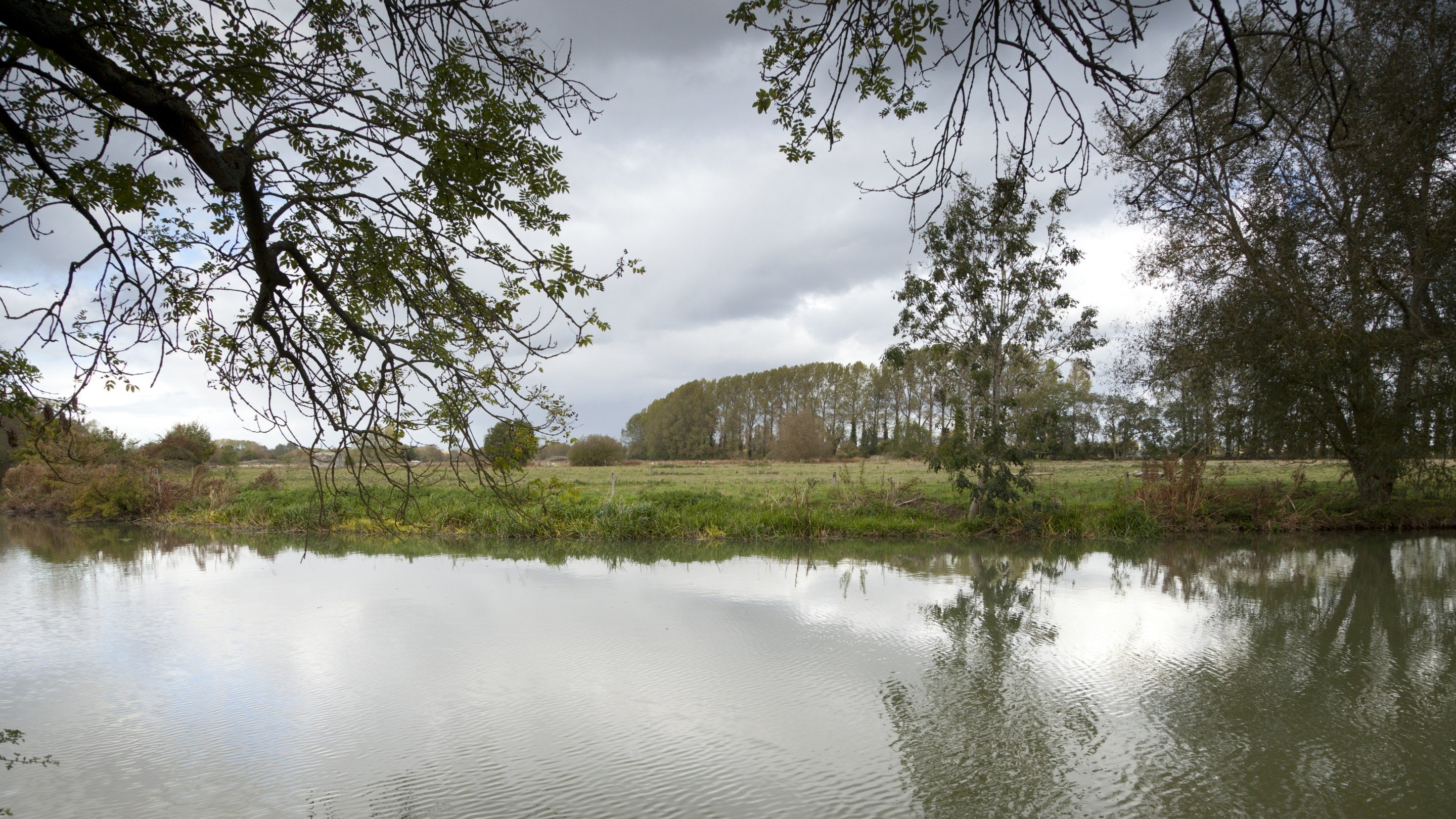 The waterfront view from Buscot Old Parsonage, Oxfordshire, over the River Thames