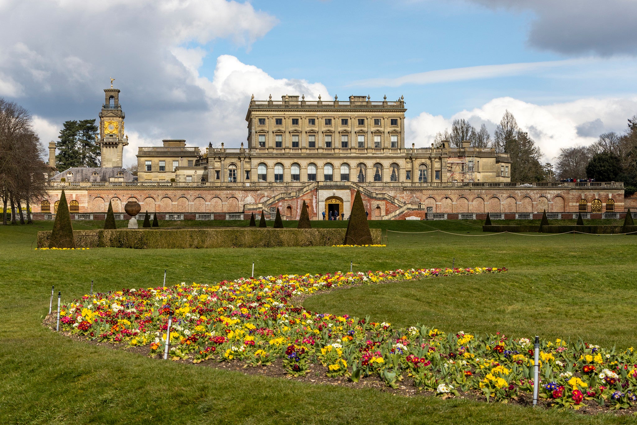 View of the parterre in spring with Cliveden House in the background