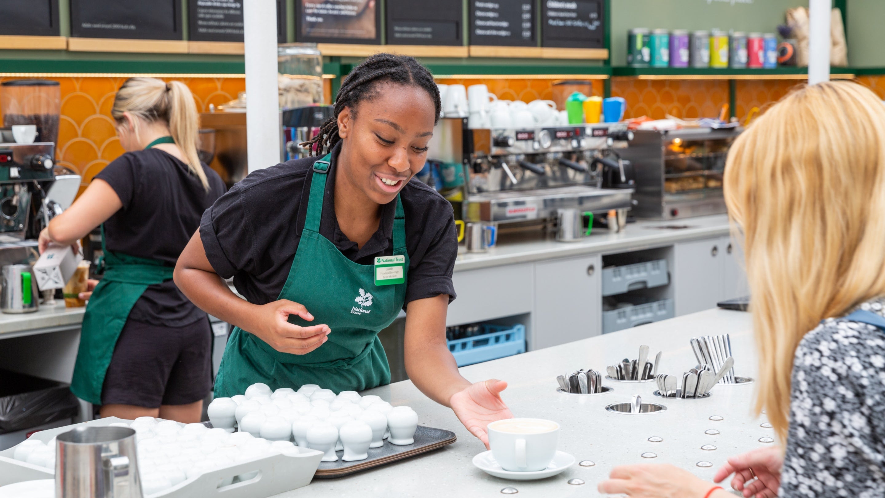 A drink is served at Conservatory Cafe, Cliveden, Buckinghamshire