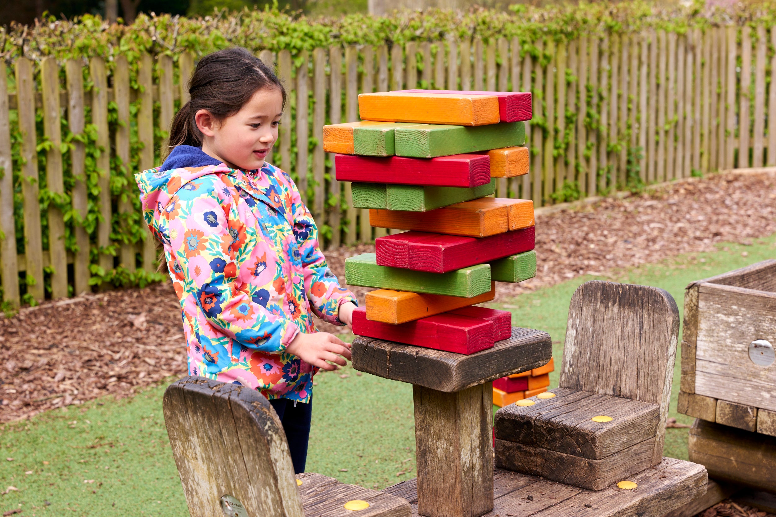 A child in the Story Book play area at Cliveden, Buckinghamshire